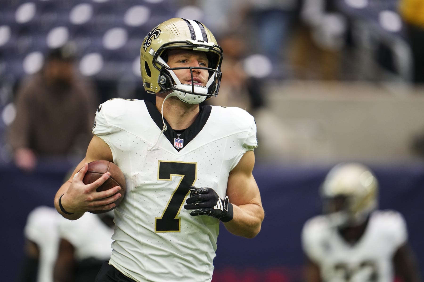 HOUSTON, TX - OCTOBER 15: Taysom Hill #7 of the New Orleans Saints warms up prior to an NFL football game against the Houston Texans at NRG Stadium on October 15, 2023 in Houston, Texas. (Photo by Cooper Neill/Getty Images)