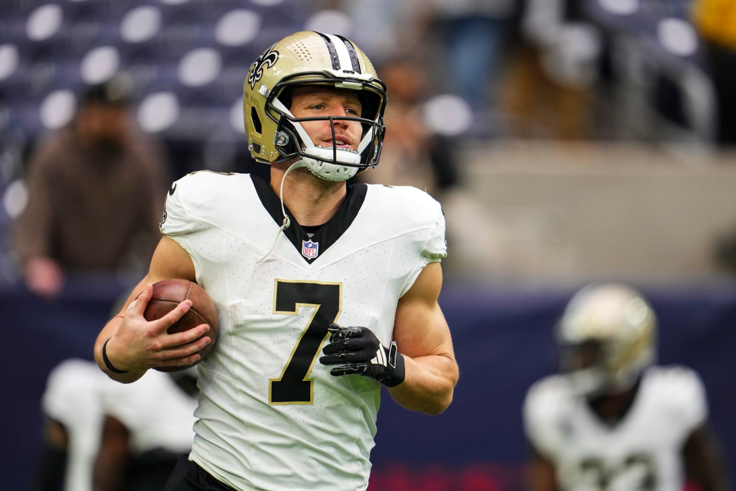 HOUSTON, TX - OCTOBER 15: Taysom Hill #7 of the New Orleans Saints warms up prior to an NFL football game against the Houston Texans at NRG Stadium on October 15, 2023 in Houston, Texas. (Photo by Cooper Neill/Getty Images)