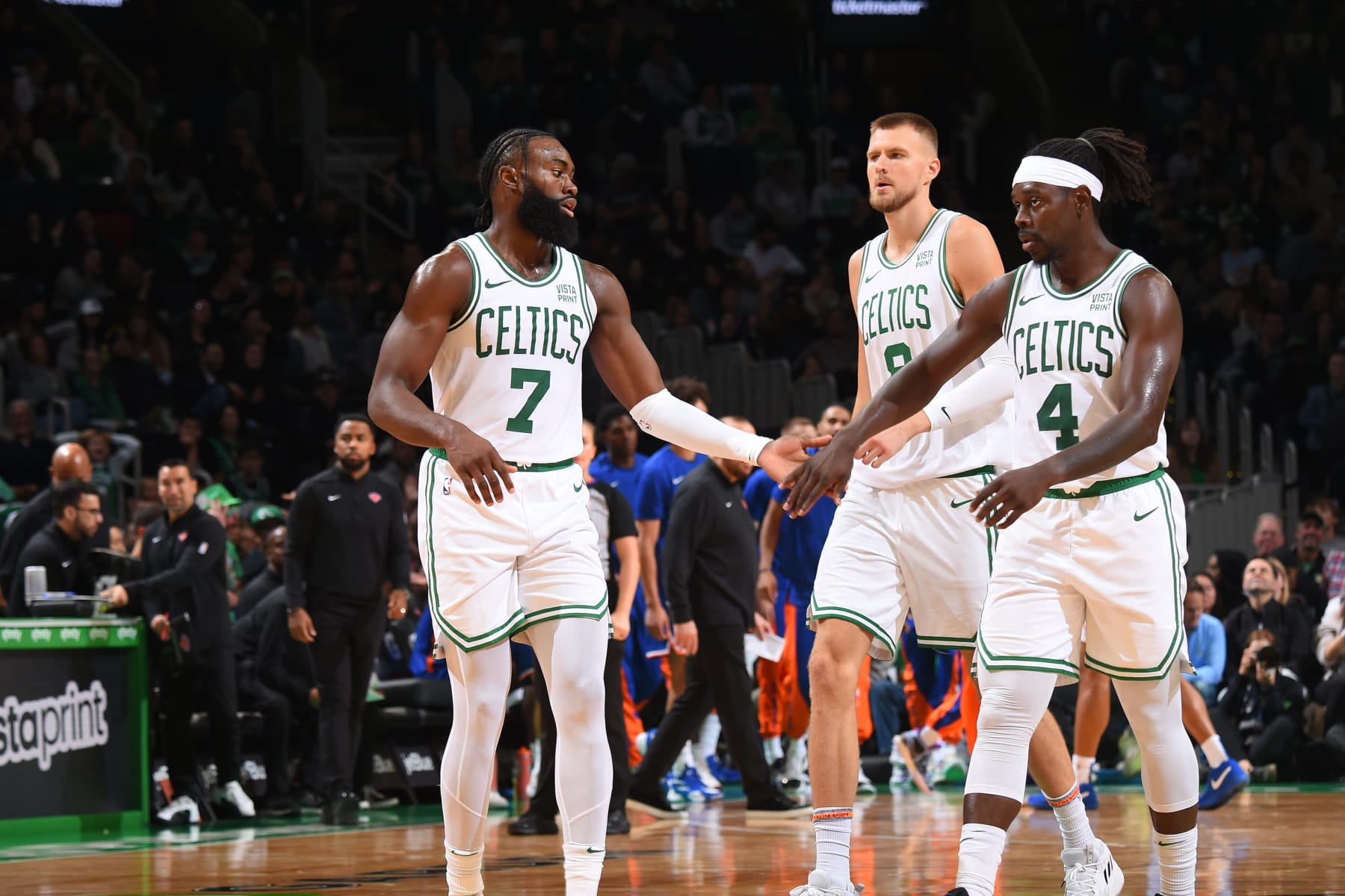 Jaylen Brown, Kristaps PorziÅÄ£is and Jrue Holiday