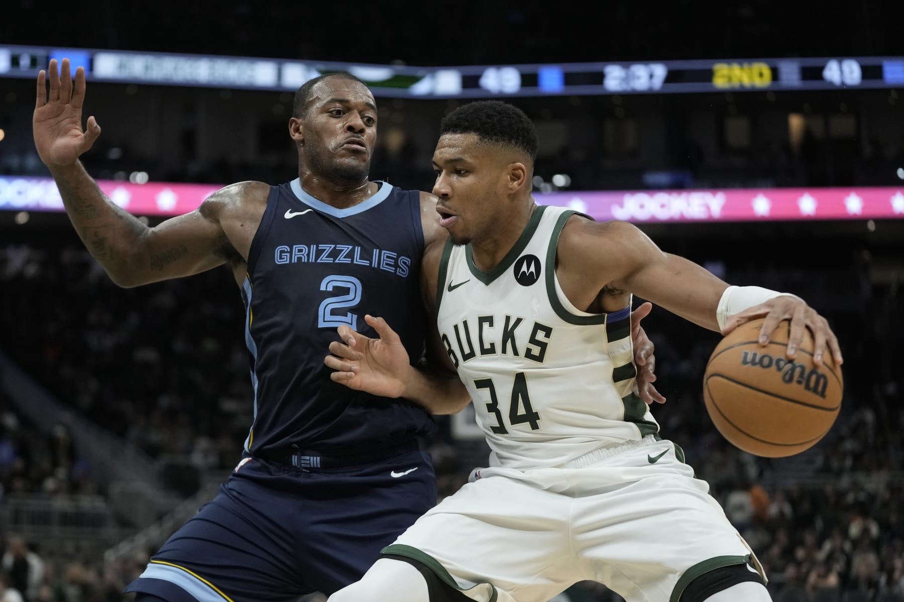 Milwaukee Bucks' Giannis Antetokounmpo drives past Memphis Grizzlies' Xavier Tillman during the first half of a preseason NBA basketball game Friday, Oct. 20, 2023, in Milwaukee. (AP Photo/Morry Gash)