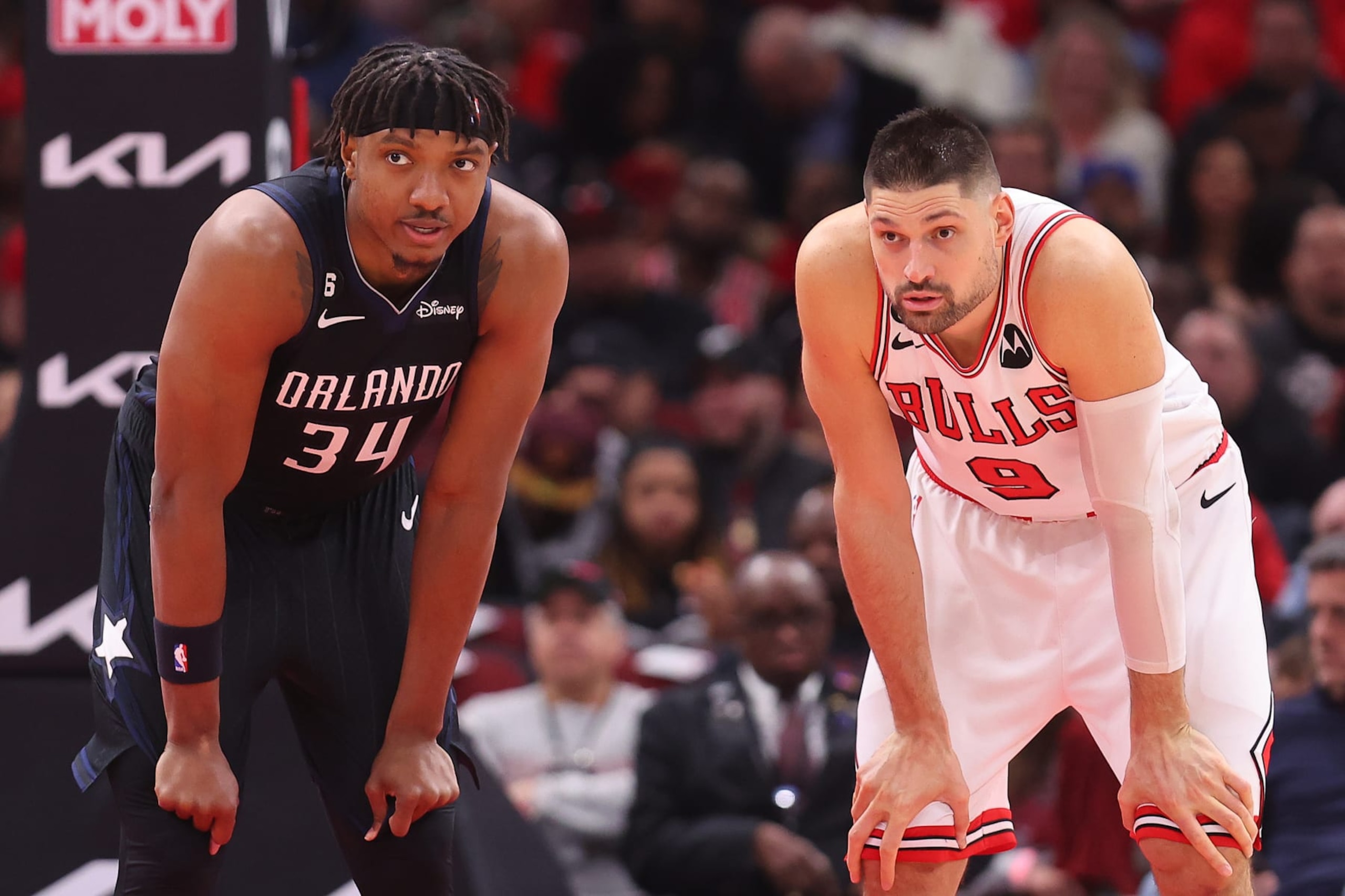 CHICAGO, ILLINOIS - FEBRUARY 13: Wendell Carter Jr. #34 of the Orlando Magic and Nikola Vucevic #9 of the Chicago Bulls laugh during the first half at United Center on February 13, 2023 in Chicago, Illinois. NOTE TO USER: User expressly acknowledges and agrees that, by downloading and or using this photograph, User is consenting to the terms and conditions of the Getty Images License Agreement. (Photo by Michael Reaves/Getty Images) CHICAGO, ILLINOIS - FEBRUARY 13: Wendell Carter Jr. #34 of the Orlando Magic and Nikola Vucevic #9 of the Chicago Bulls laugh during the first half at United Center on February 13, 2023 in Chicago, Illinois. NOTE TO USER: User expressly acknowledges and agrees that, by downloading and or using this photograph, User is consenting to the terms and conditions of the Getty Images License Agreement. (Photo by Michael Reaves/Getty Images)