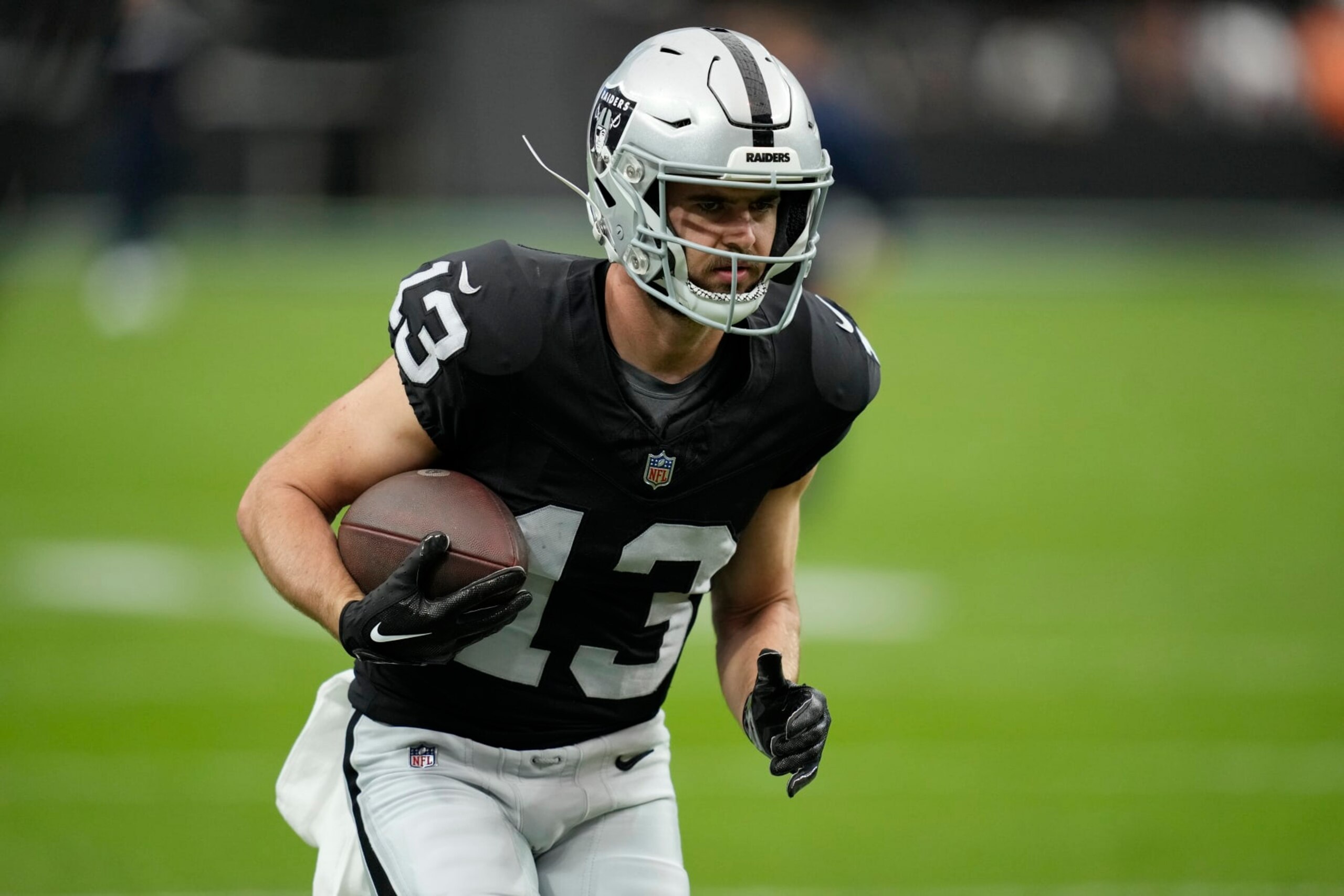 Las Vegas Raiders wide receiver Hunter Renfrow (13) warms up before an NFL football game against the New England Patriots, Sunday, Oct. 15, 2023, in Las Vegas. (AP Photo/John Locher) Las Vegas Raiders wide receiver Hunter Renfrow (13) warms up before an NFL football game against the New England Patriots, Sunday, Oct. 15, 2023, in Las Vegas. (AP Photo/John Locher)
