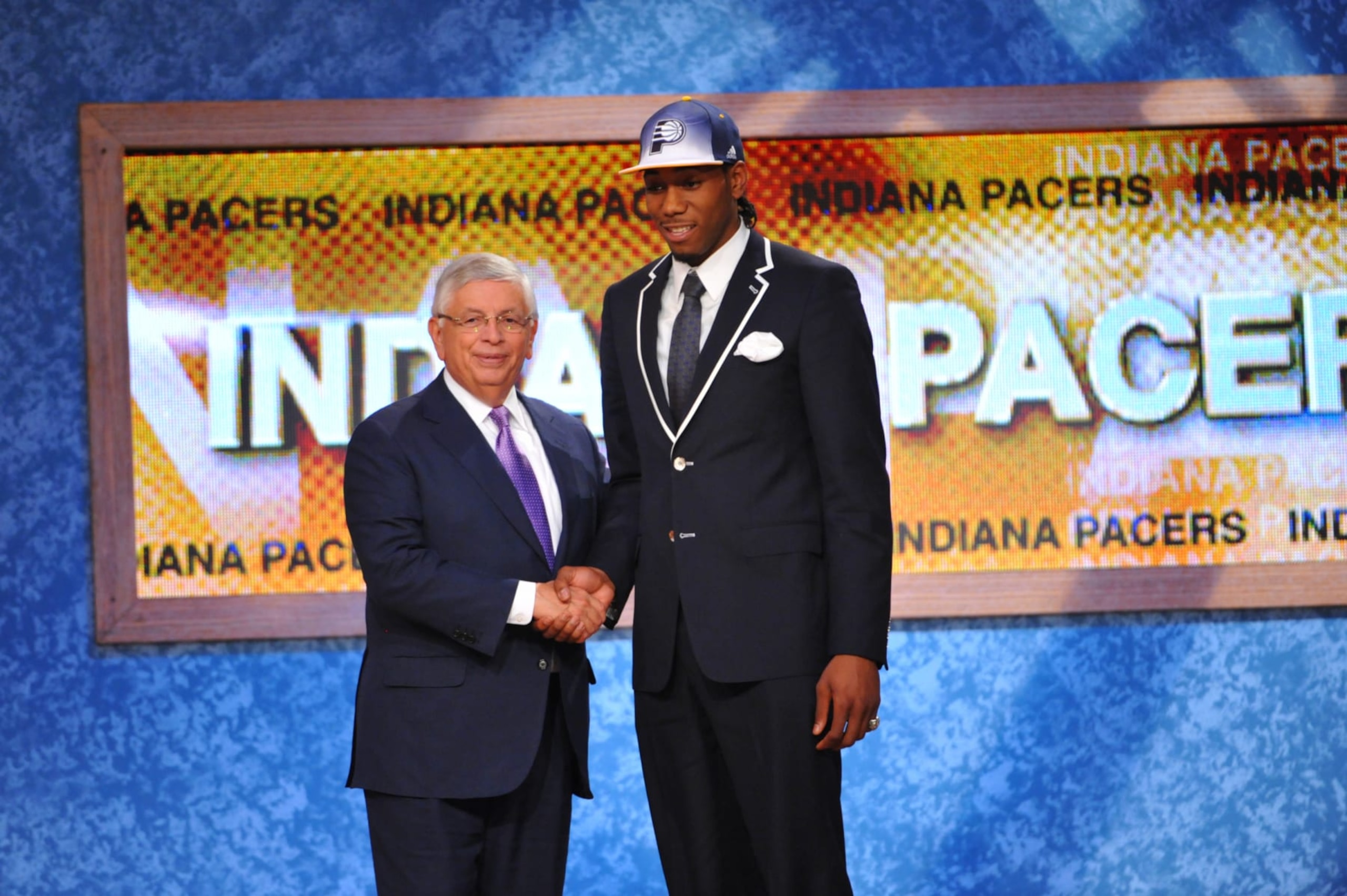 NEWARK, NJ - JUNE 23: Kawhi Leonard shakes hands with NBA Commissioner David Stern after being selected number fifteen overall by the Indiana Pacers during the 2011 NBA Draft Presented by KIA at the Prudential Center on June 23, 2011 in Newark, New Jersey. NOTE TO USER: User expressly acknowledges and agrees that, by downloading and or using this photograph, User is consenting to the terms and conditions of the Getty Images License Agreement. Mandatory Copyright Notice: Copyright 2011 NBAE (Photo by Jesse D. Garrabrant/NBAE via Getty Images) NEWARK, NJ - JUNE 23: Kawhi Leonard shakes hands with NBA Commissioner David Stern after being selected number fifteen overall by the Indiana Pacers during the 2011 NBA Draft Presented by KIA at the Prudential Center on June 23, 2011 in Newark, New Jersey. NOTE TO USER: User expressly acknowledges and agrees that, by downloading and or using this photograph, User is consenting to the terms and conditions of the Getty Images License Agreement. Mandatory Copyright Notice: Copyright 2011 NBAE (Photo by Jesse D. Garrabrant/NBAE via Getty Images)