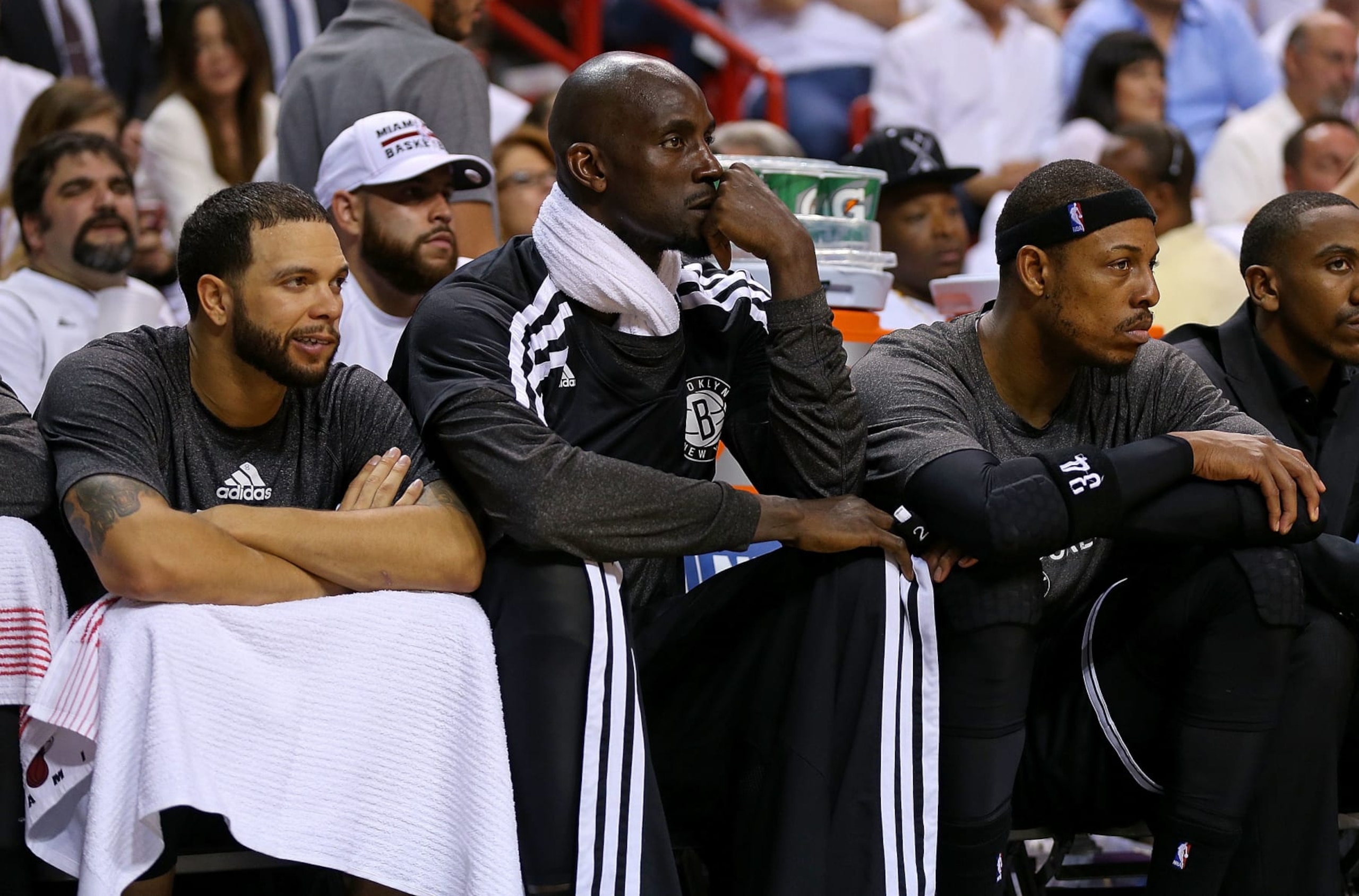 MIAMI, FL - MAY 06: Deron Williams #8, Kevin Garnett #2 and Paul Pierce #34 of the Brooklyn Nets look on during Game One of the Eastern Conference Semifinals of the 2014 NBA Playoffs against the Miami Heat at American Airlines Arena on May 6, 2014 in Miami, Florida. NOTE TO USER: User expressly acknowledges and agrees that, by downloading and/or using this photograph, user is consenting to the terms and conditions of the Getty Images License Agreement. Mandatory copyright notice: (Photo by Mike Ehrmann/Getty Images) MIAMI, FL - MAY 06: Deron Williams #8, Kevin Garnett #2 and Paul Pierce #34 of the Brooklyn Nets look on during Game One of the Eastern Conference Semifinals of the 2014 NBA Playoffs against the Miami Heat at American Airlines Arena on May 6, 2014 in Miami, Florida. NOTE TO USER: User expressly acknowledges and agrees that, by downloading and/or using this photograph, user is consenting to the terms and conditions of the Getty Images License Agreement. Mandatory copyright notice: (Photo by Mike Ehrmann/Getty Images)