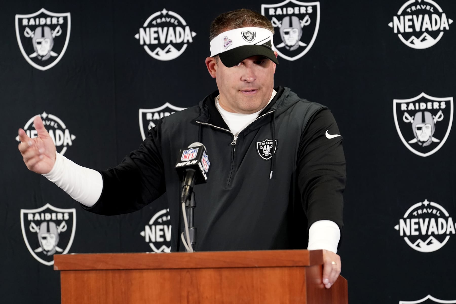 Las Vegas Raiders head coach Josh McDaniels responds to a question after an NFL football game against the Chicago Bears Sunday, Oct. 22, 2023, in Chicago. (AP Photo/Charles Rex Arbogast)