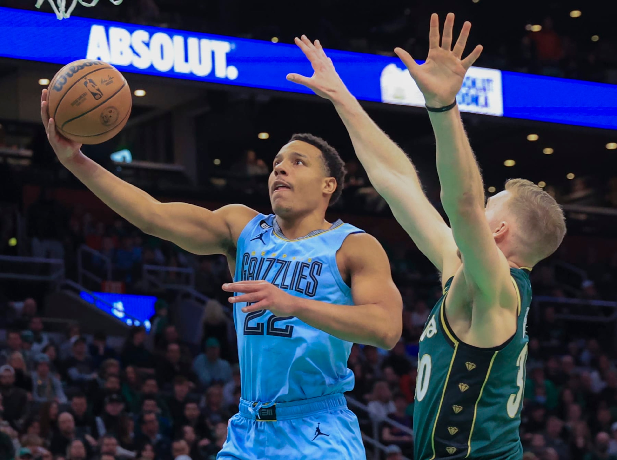 Boston, MA - February 12: Memphis Grizzlies SG Desmond Bane goes in for a lay-up against Boston Celtics SF Sam Hauser in the first quarter. The Celtics beat the Grizzlies, 119-109. (Photo by Matthew J. Lee/The Boston Globe via Getty Images) Boston, MA - February 12: Memphis Grizzlies SG Desmond Bane goes in for a lay-up against Boston Celtics SF Sam Hauser in the first quarter. The Celtics beat the Grizzlies, 119-109. (Photo by Matthew J. Lee/The Boston Globe via Getty Images)