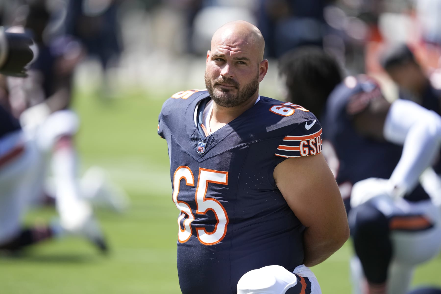 Chicago Bears center Cody Whitehair warms up in an NFL preseason football game against the Tennessee Titans Saturday, August 12, 2023, in Chicago. (AP Photo/Charles Rex Arbogast)