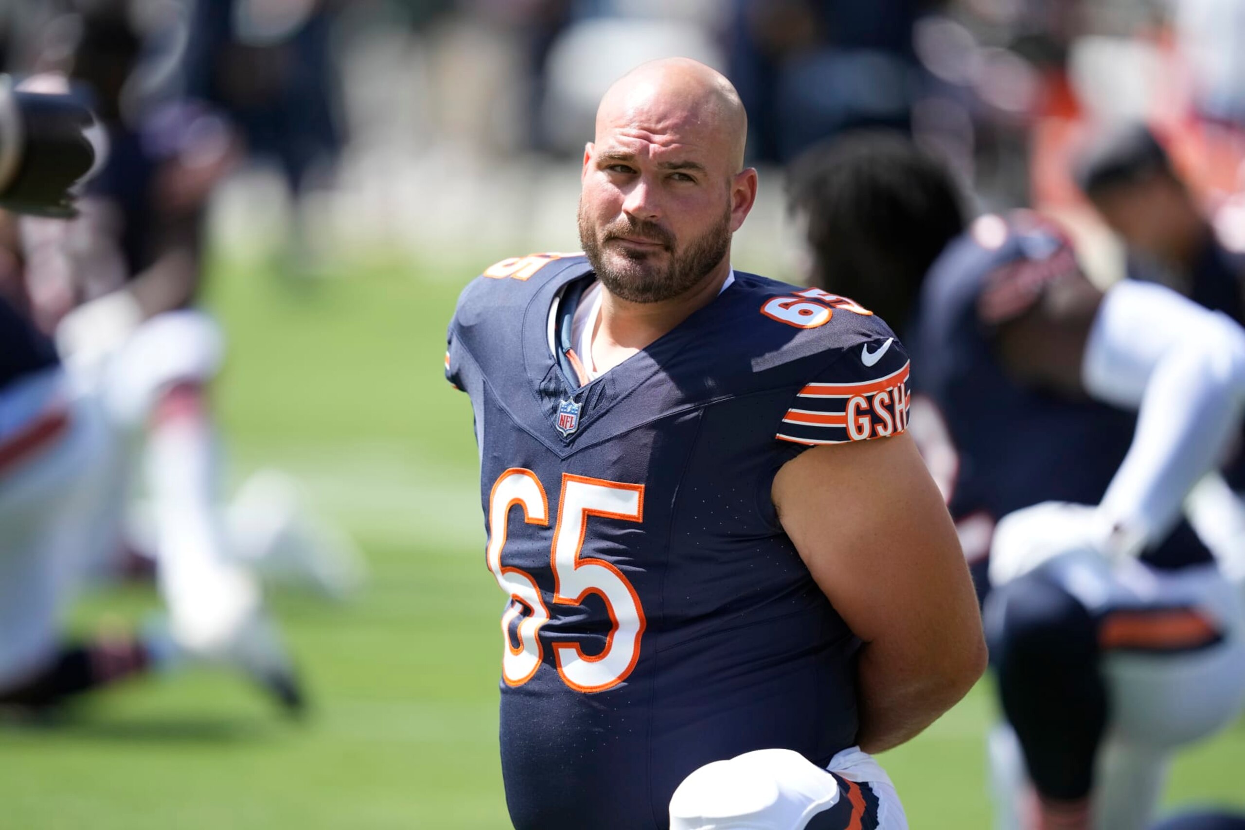 Chicago Bears center Cody Whitehair warms up in an NFL preseason football game against the Tennessee Titans Saturday, August 12, 2023, in Chicago. (AP Photo/Charles Rex Arbogast)