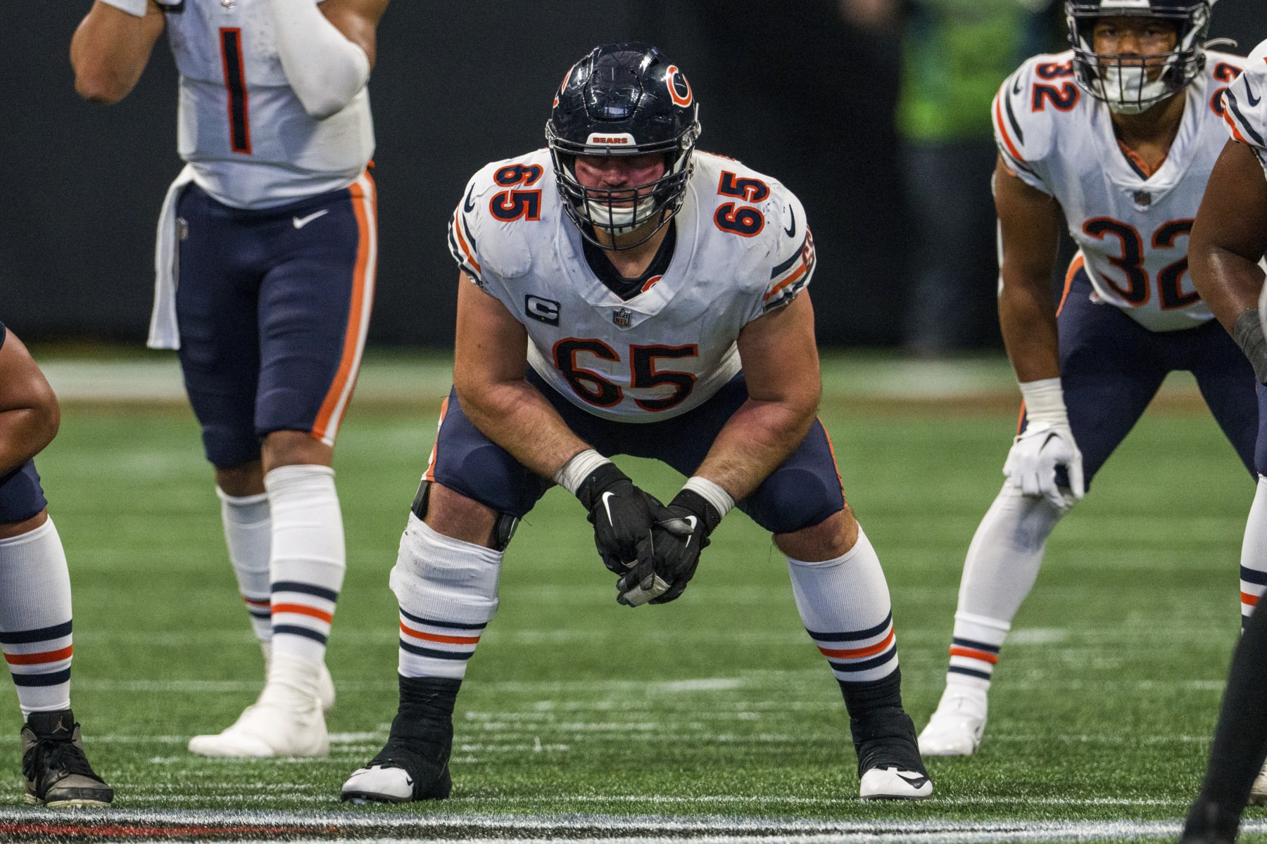 Chicago Bears center Cody Whitehair (65) works during the first half of an NFL football game against the Atlanta Falcons, Sunday, Nov. 20, 2022, in Atlanta. The Atlanta Falcons won 27-24. (AP Photo/Danny Karnik)