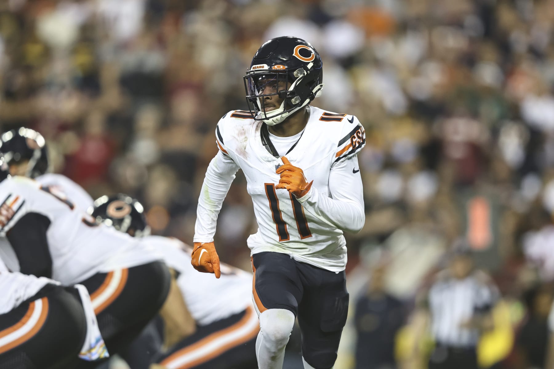 LANDOVER, MARYLAND - OCTOBER 05: Darnell Mooney #11 of the Chicago Bears runs during an NFL football game between the Washington Commanders and the Chicago Bears at FedExField on October 05, 2023 in Landover, Maryland. (Photo by Michael Owens/Getty Images)