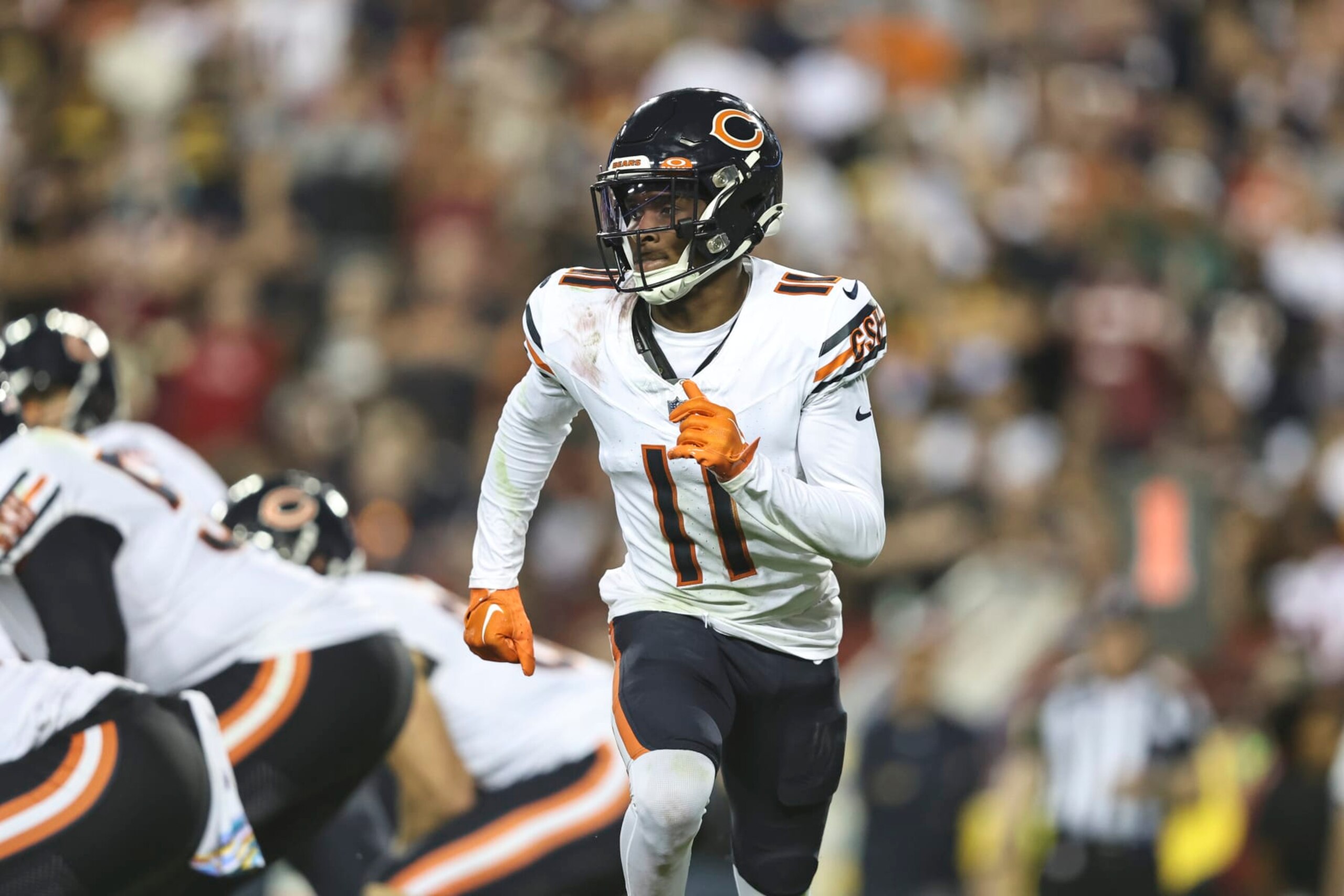 LANDOVER, MARYLAND - OCTOBER 05: Darnell Mooney #11 of the Chicago Bears runs during an NFL football game between the Washington Commanders and the Chicago Bears at FedExField on October 05, 2023 in Landover, Maryland. (Photo by Michael Owens/Getty Images)