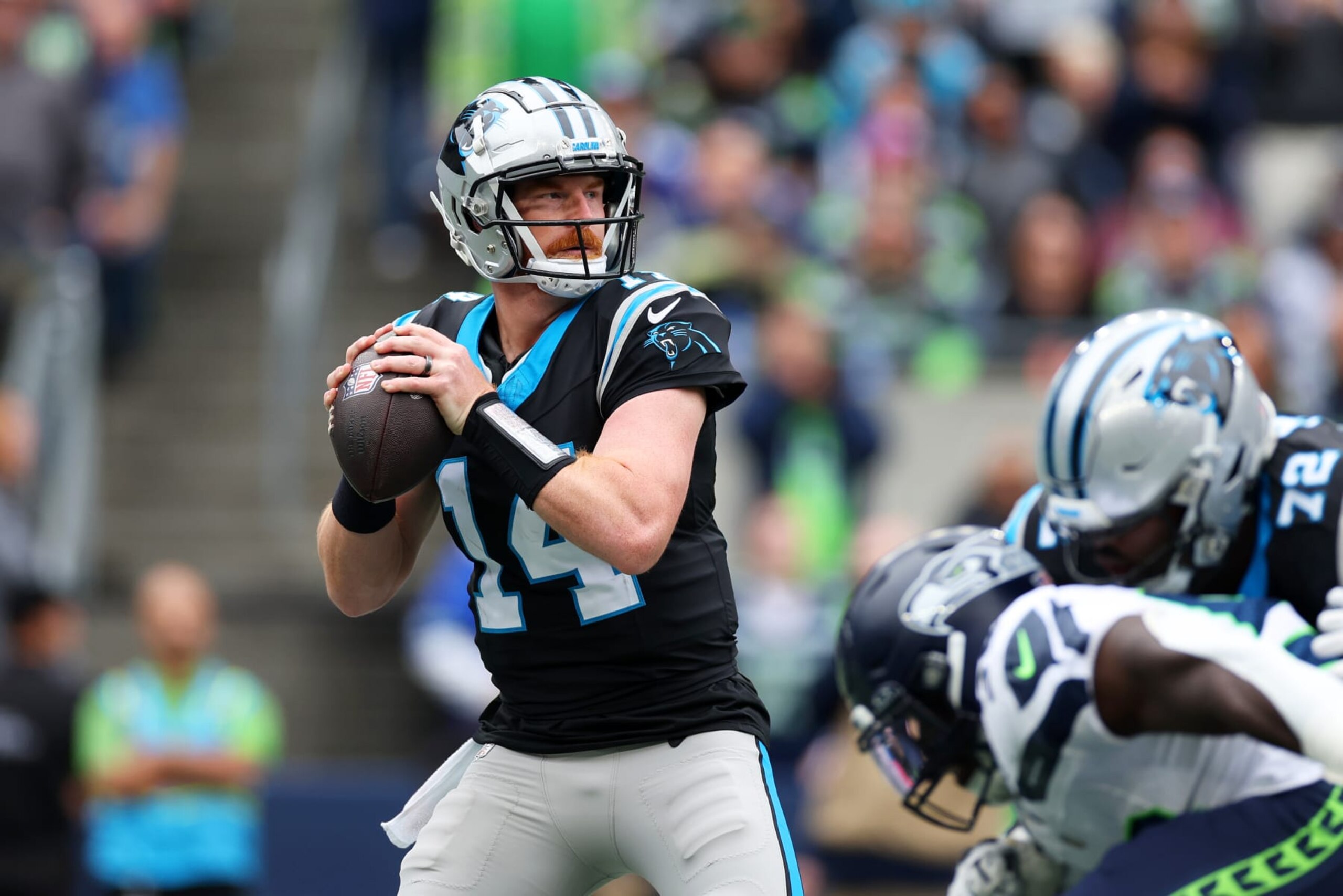 SEATTLE, WASHINGTON - SEPTEMBER 24: Andy Dalton #14 of the Carolina Panthers attempts a pass during the first half against the Seattle Seahawks at Lumen Field on September 24, 2023 in Seattle, Washington. (Photo by Steph Chambers/Getty Images)