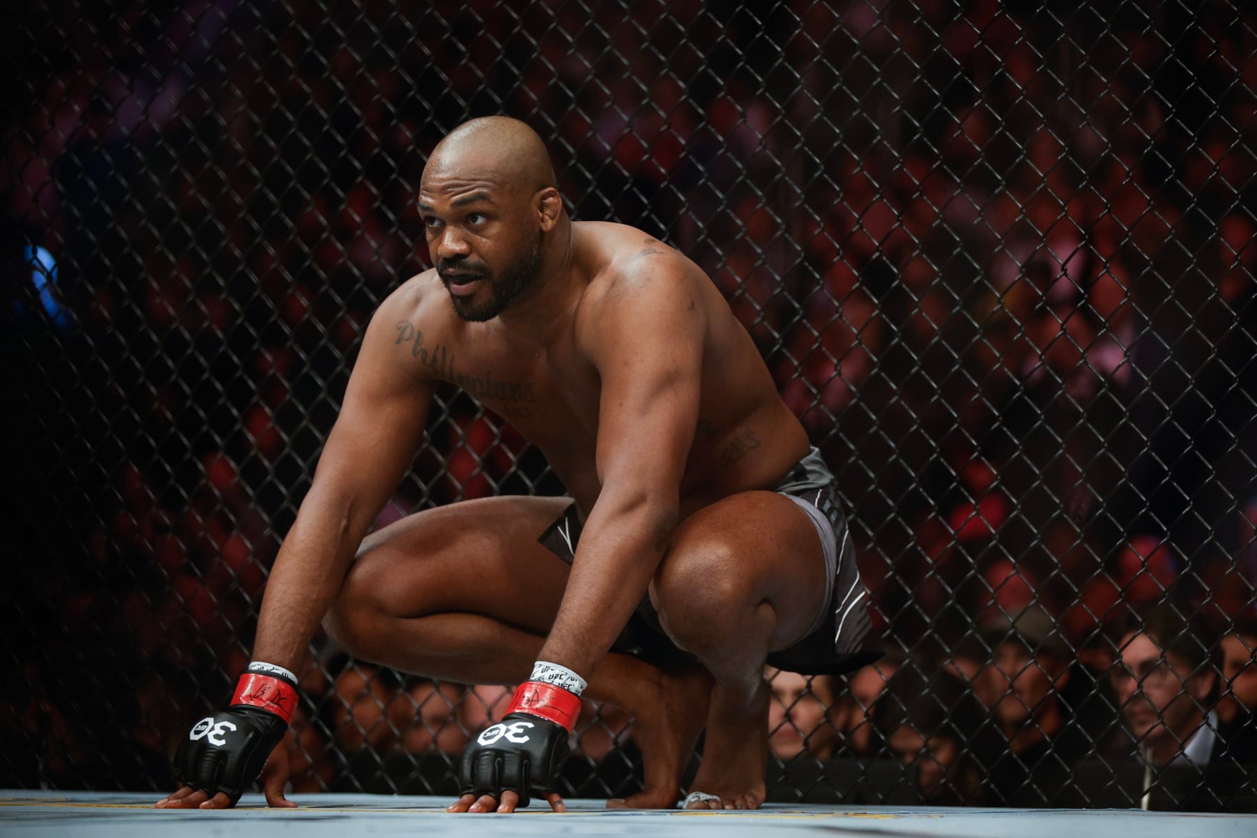 LAS VEGAS, NEVADA - MARCH 04: Jon Jones looks on during the UFC heavyweight championship fight against Ciryl Gane of France during the UFC 285 event at T-Mobile Arena on March 04, 2023 in Las Vegas, Nevada. (Photo by Chris Graythen/Getty Images) LAS VEGAS, NEVADA - MARCH 04: Jon Jones looks on during the UFC heavyweight championship fight against Ciryl Gane of France during the UFC 285 event at T-Mobile Arena on March 04, 2023 in Las Vegas, Nevada. (Photo by Chris Graythen/Getty Images)