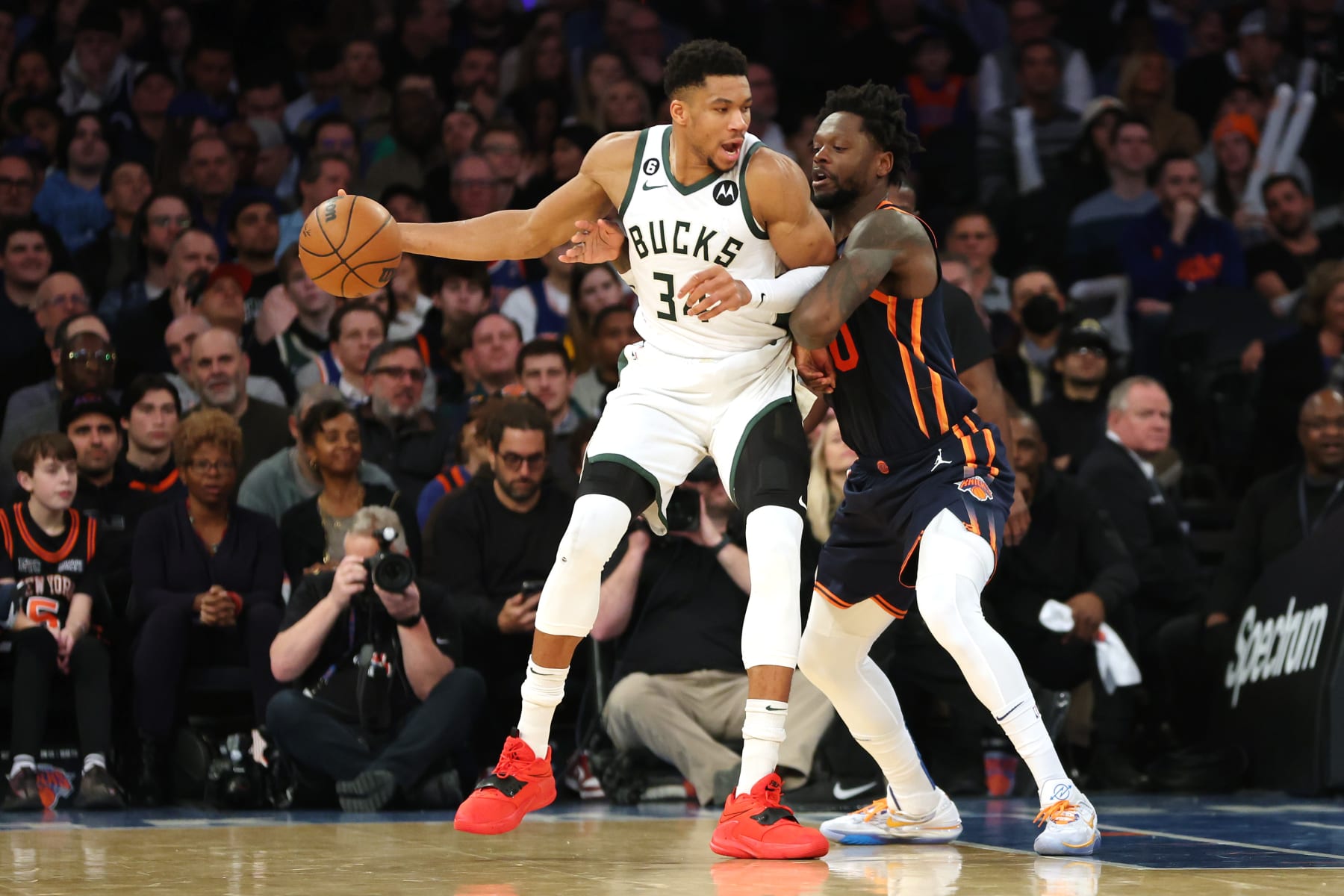 NEW YORK, NEW YORK - JANUARY 09: Giannis Antetokounmpo #34 of the Milwaukee Bucks dribbles against Julius Randle #30 of the New York Knicks during the first half at Madison Square Garden on January 09, 2023 in New York City. NOTE TO USER: User expressly acknowledges and agrees that, by downloading and/or using this photograph, User is consenting to the terms and conditions of the Getty Images License Agreement. (Photo by Sarah Stier/Getty Images)