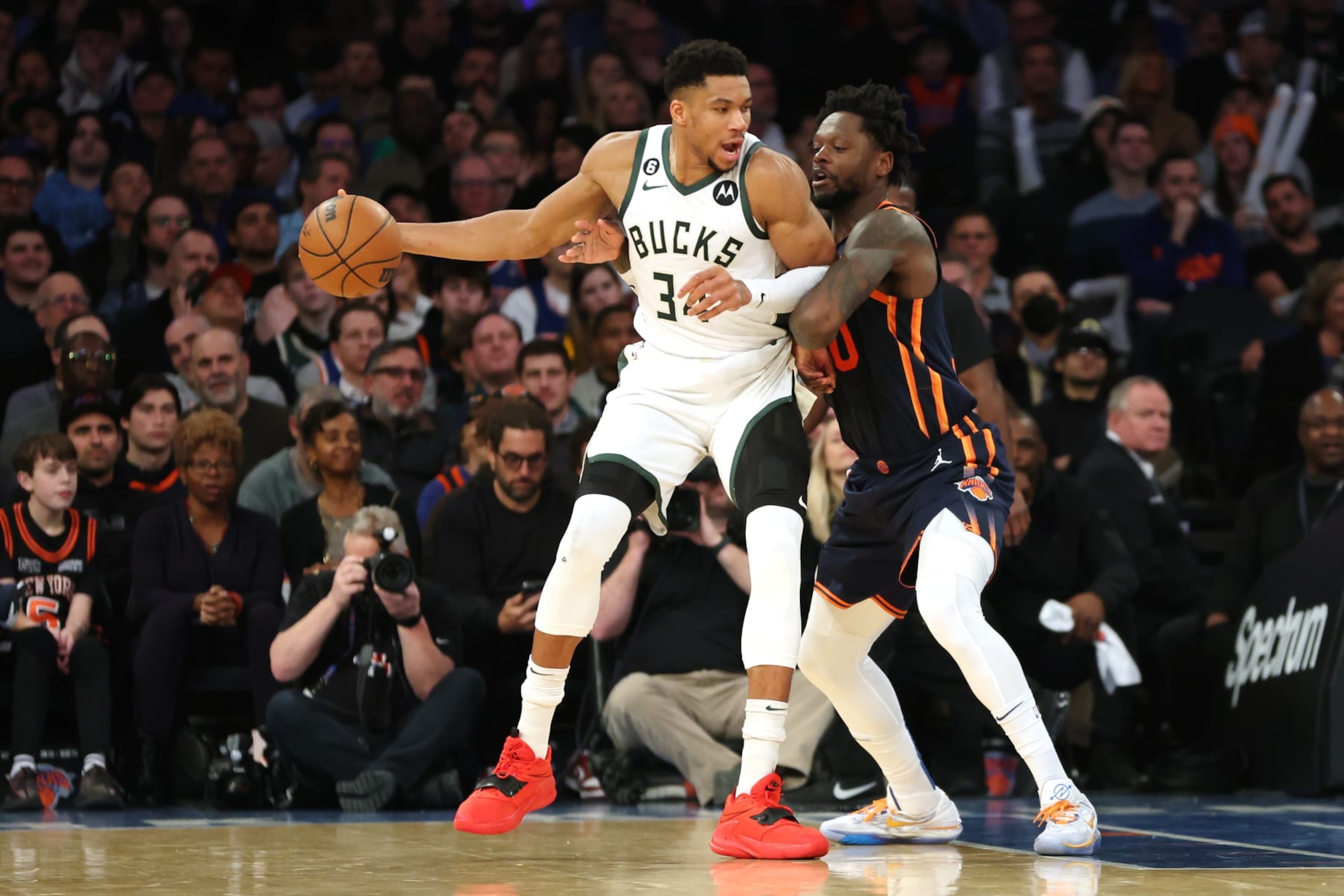 NEW YORK, NEW YORK - JANUARY 09: Giannis Antetokounmpo #34 of the Milwaukee Bucks dribbles against Julius Randle #30 of the New York Knicks during the first half at Madison Square Garden on January 09, 2023 in New York City. NOTE TO USER: User expressly acknowledges and agrees that, by downloading and/or using this photograph, User is consenting to the terms and conditions of the Getty Images License Agreement. (Photo by Sarah Stier/Getty Images)