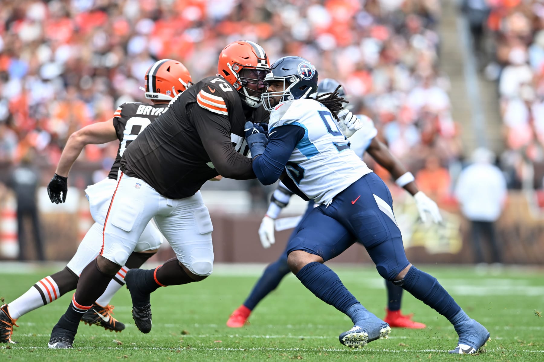 CLEVELAND, OHIO - SEPTEMBER 24: Denico Autry #96 of the Tennessee Titans rushes against Dawand Jones #79 of the Cleveland Browns during the first half at Cleveland Browns Stadium on September 24, 2023 in Cleveland, Ohio. (Photo by Nick Cammett/Diamond Images via Getty Images)