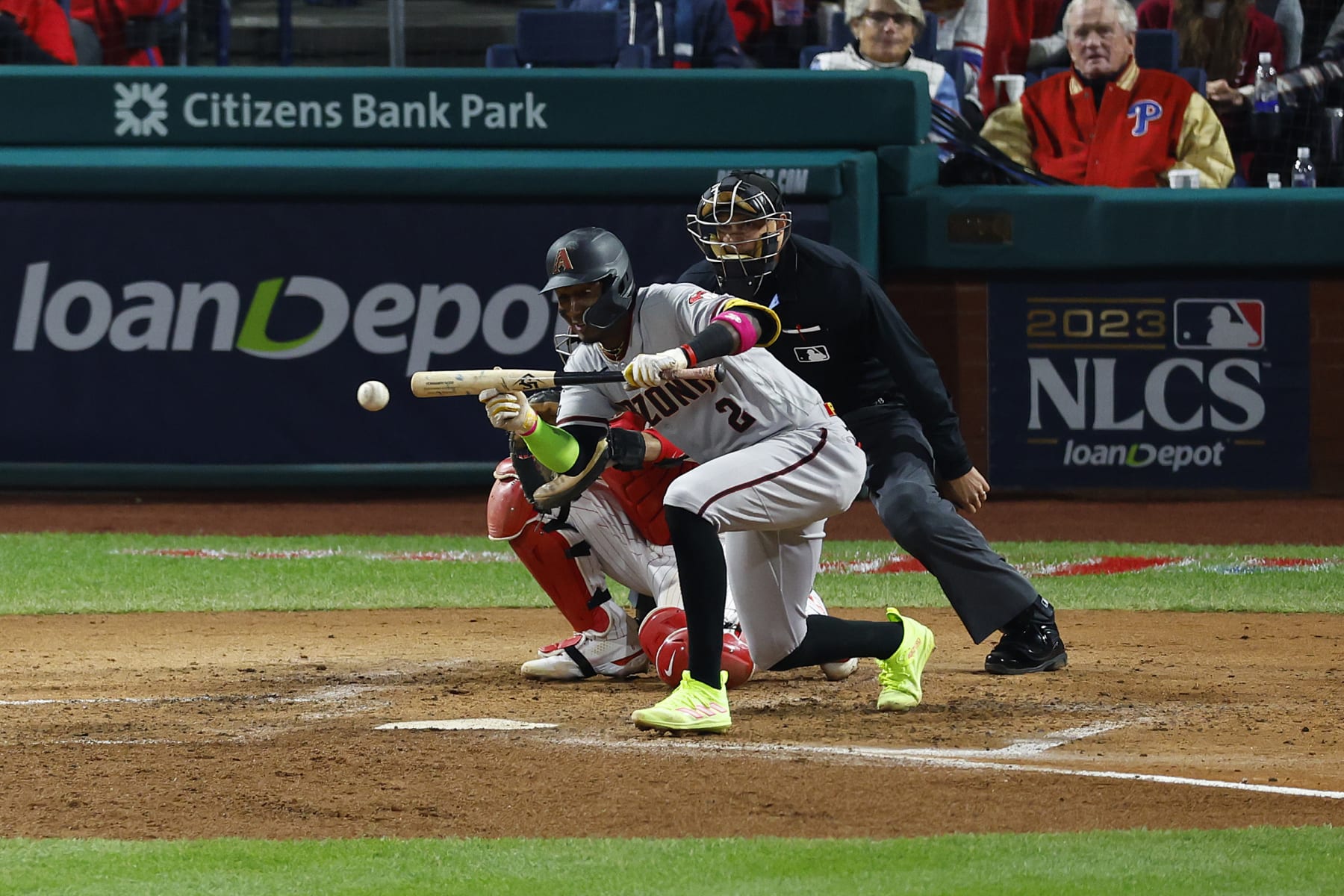 PHILADELPHIA, PENNSYLVANIA - OCTOBER 24: Geraldo Perdomo #2 of the Arizona Diamondbacks hits a sacrifice bunt against the Philadelphia Phillies during the fifth inning in Game Seven of the Championship Series at Citizens Bank Park on October 24, 2023 in Philadelphia, Pennsylvania. (Photo by Rich Schultz/Getty Images)