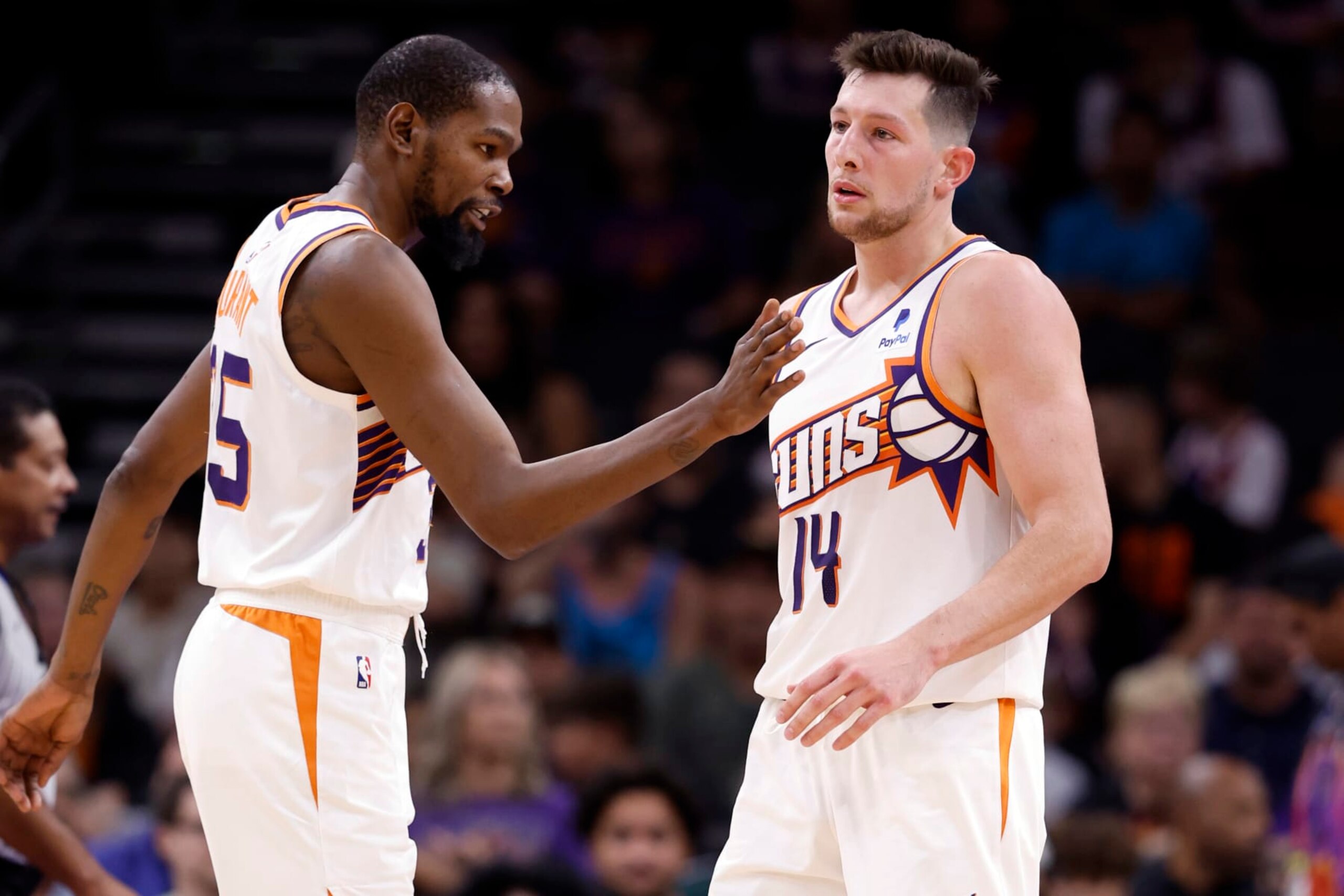 PHOENIX, ARIZONA - OCTOBER 16: Kevin Durant #35 of the Phoenix Suns greets Drew Eubanks #14 during the game against the Portland Trail Blazers at Footprint Center on October 16, 2023 in Phoenix, Arizona. The Suns defeated the Trail Blazers 117-106. NOTE TO USER: User expressly acknowledges and agrees that, by downloading and or using this photograph, User is consenting to the terms and conditions of the Getty Images License Agreement. (Photo by Chris Coduto/Getty Images) PHOENIX, ARIZONA - OCTOBER 16: Kevin Durant #35 of the Phoenix Suns greets Drew Eubanks #14 during the game against the Portland Trail Blazers at Footprint Center on October 16, 2023 in Phoenix, Arizona. The Suns defeated the Trail Blazers 117-106. NOTE TO USER: User expressly acknowledges and agrees that, by downloading and or using this photograph, User is consenting to the terms and conditions of the Getty Images License Agreement. (Photo by Chris Coduto/Getty Images)