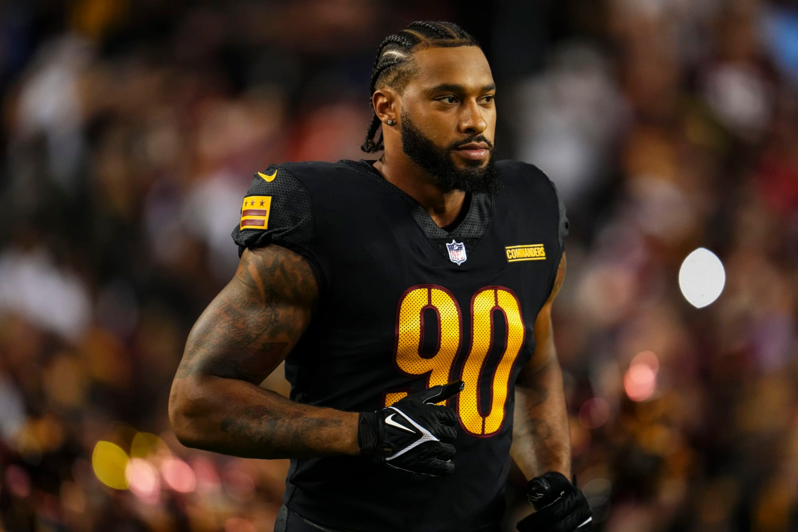 LANDOVER, MD - OCTOBER 05: Montez Sweat #90 of the Washington Commanders runs out of the tunnel prior to an NFL game against the Chicago Bears at FedEx Field on October 5, 2023 in Landover, Maryland. (Photo by Cooper Neill/Getty Images)