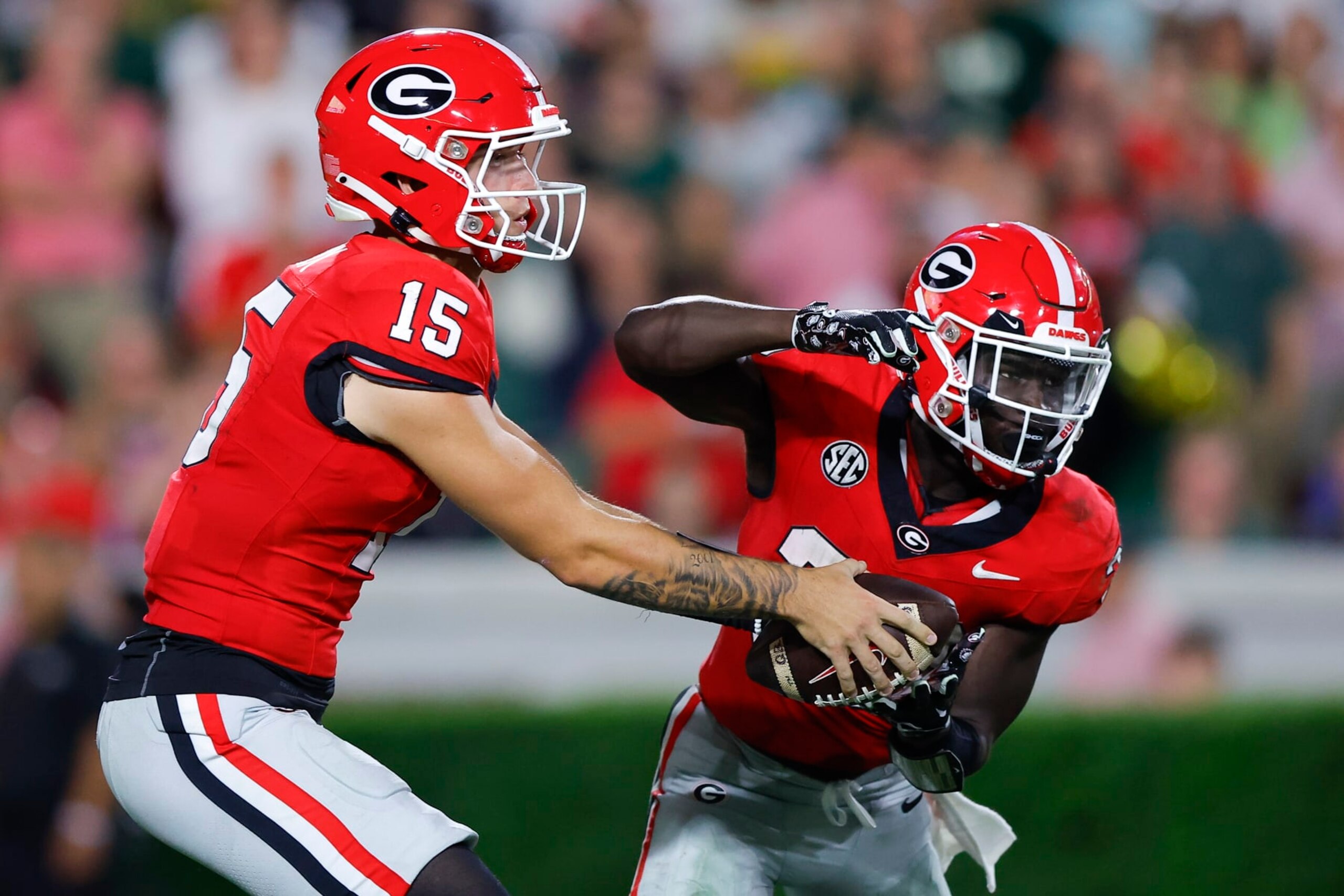 Carson Beck, left, and Daijun Edwards