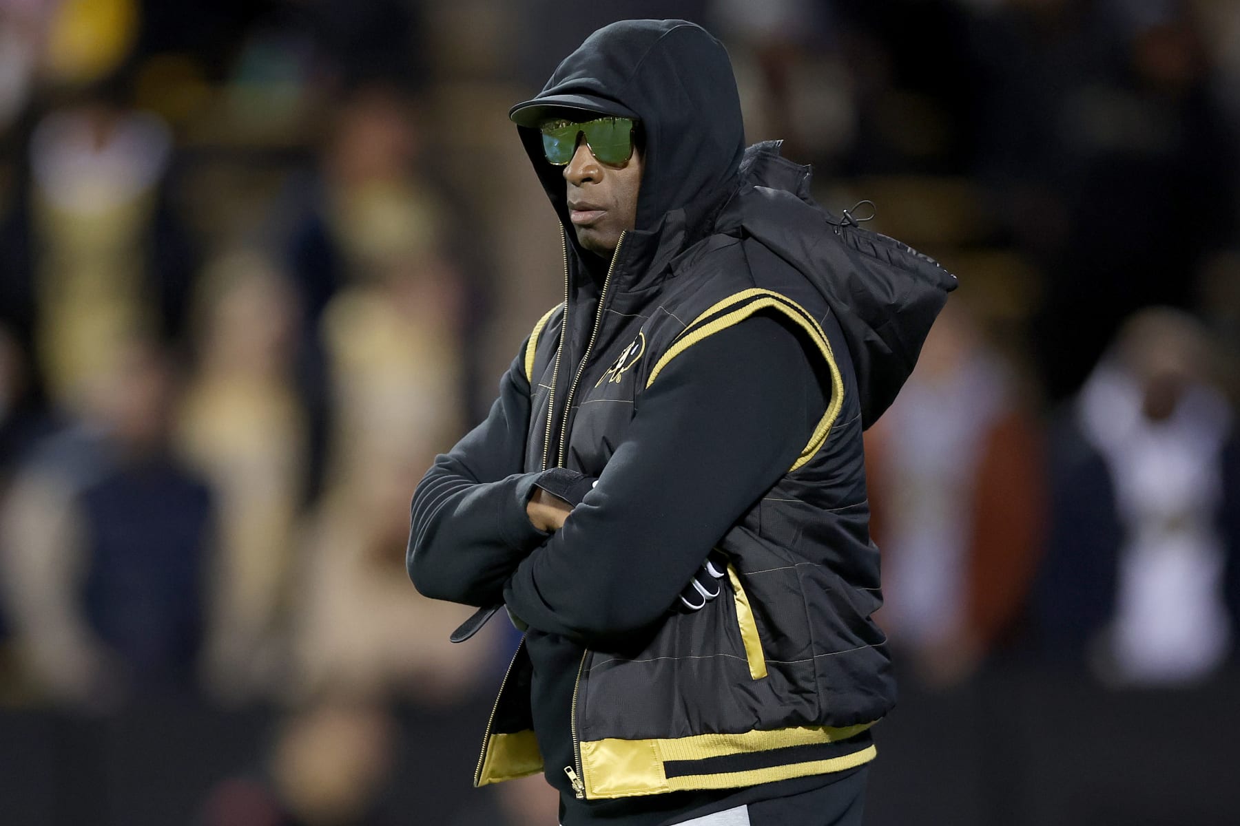 BOULDER, COLORADO - OCTOBER 13: Head coach Deion Sanders of the Colorado Buffaloes walks on the field during pregame against the Stanford Cardinal at Folsom Field on October 13, 2023 in Boulder, Colorado. (Photo by Matthew Stockman/Getty Images)