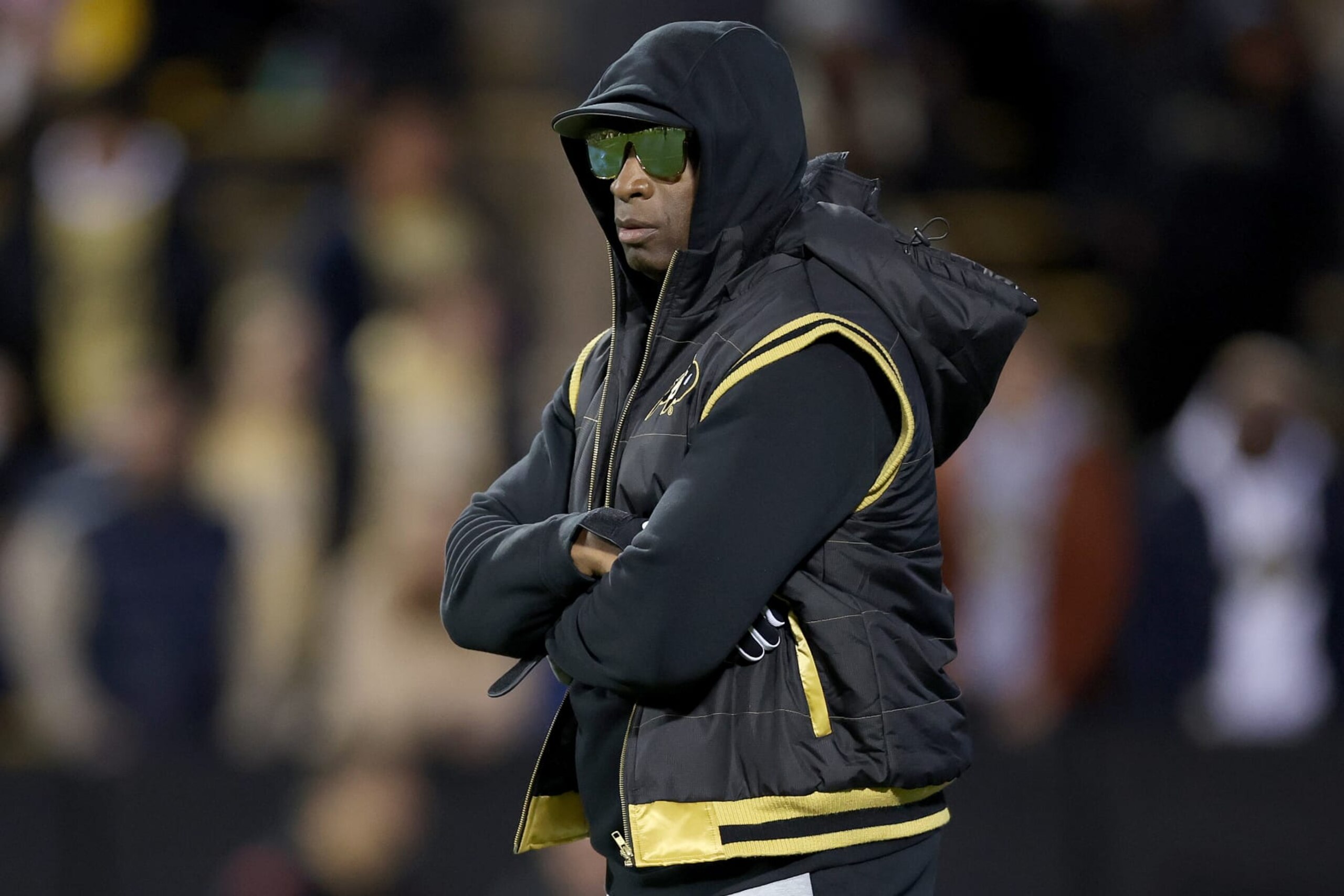 BOULDER, COLORADO - OCTOBER 13: Head coach Deion Sanders of the Colorado Buffaloes walks on the field during pregame against the Stanford Cardinal at Folsom Field on October 13, 2023 in Boulder, Colorado. (Photo by Matthew Stockman/Getty Images)