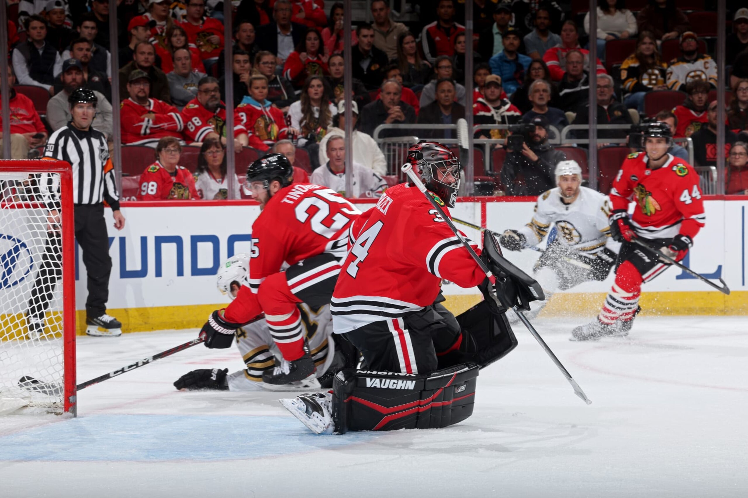 CHICAGO, ILLINOIS - OCTOBER 24: Goalie Petr Mrazek #34 of the Chicago Blackhawks looks down the ice in the first period against the Boston Bruins at the United Center on October 24, 2023 in Chicago, Illinois. (Photo by Chase Agnello-Dean/NHLI via Getty Images)