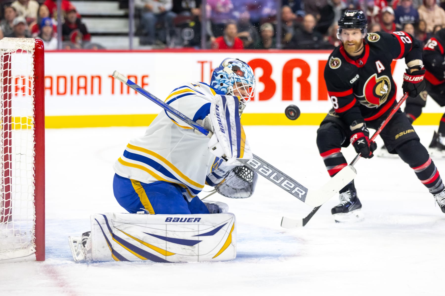 OTTAWA, ON - OCTOBER 24: Buffalo Sabres Goalie Ukko-Pekka Luukkonen (1) makes a save with Ottawa Senators Right Wing Claude Giroux (28) looking for the rebound during first period National Hockey League action between the Buffalo Sabres and Ottawa Senators on October 24, 2023, at Canadian Tire Centre in Ottawa, ON, Canada. (Photo by Richard A. Whittaker/Icon Sportswire via Getty Images)