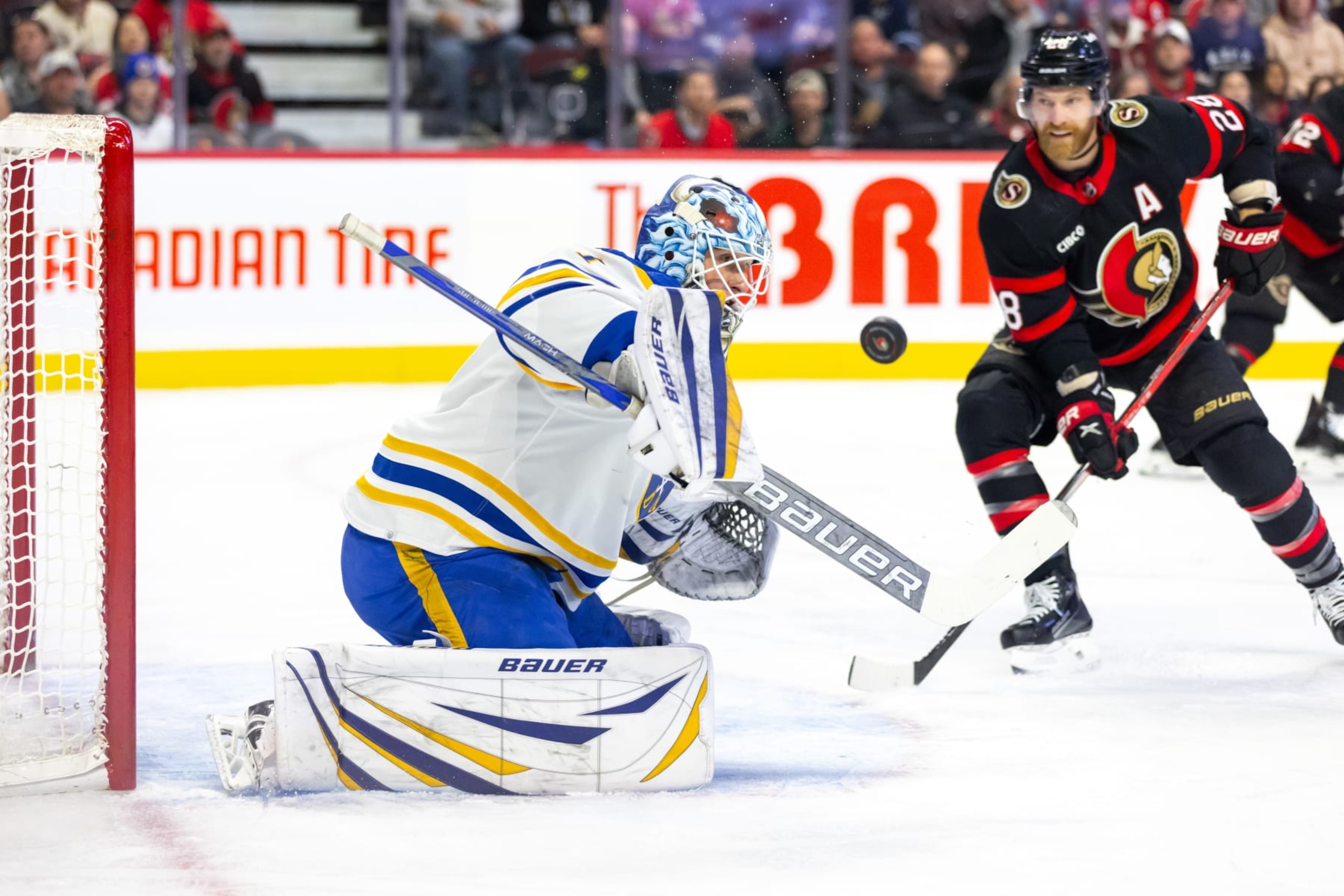 OTTAWA, ON - OCTOBER 24: Buffalo Sabres Goalie Ukko-Pekka Luukkonen (1) makes a save with Ottawa Senators Right Wing Claude Giroux (28) looking for the rebound during first period National Hockey League action between the Buffalo Sabres and Ottawa Senators on October 24, 2023, at Canadian Tire Centre in Ottawa, ON, Canada. (Photo by Richard A. Whittaker/Icon Sportswire via Getty Images)