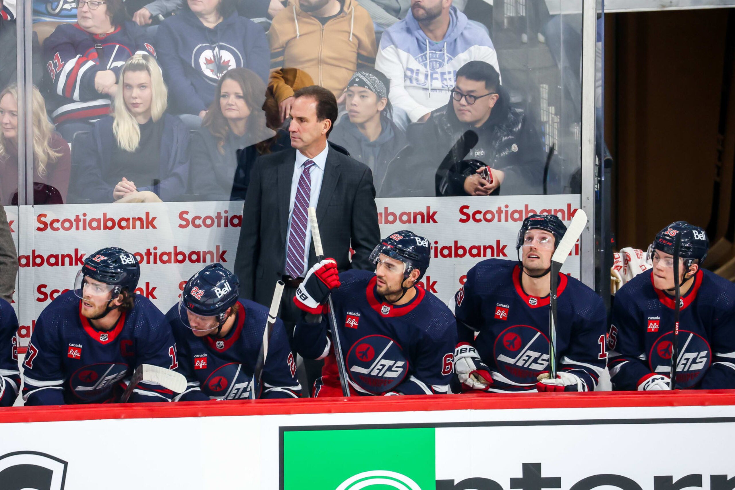WINNIPEG, CANADA - OCTOBER 24: Interim Head Coach Scott Arniel of the Winnipeg Jets looks on from the bench during first period action against the St. Louis Blues at the Canada Life Centre on October 24, 2023 in Winnipeg, Manitoba, Canada. (Photo by Jonathan Kozub/NHLI via Getty Images)