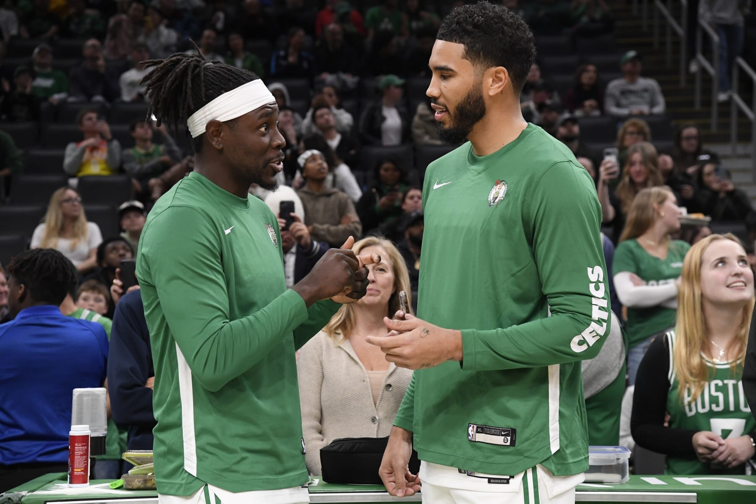 BOSTON, MA - OCTOBER 17: Jrue Holiday #4 talks to Jayson Tatum #0 of the Boston Celtics before the game against the New York Knicks on October 17, 2023 at the TD Garden in Boston, Massachusetts. NOTE TO USER: User expressly acknowledges and agrees that, by downloading and or using this photograph, User is consenting to the terms and conditions of the Getty Images License Agreement. Mandatory Copyright Notice: Copyright 2023 NBAE  (Photo by Brian Babineau/NBAE via Getty Images)