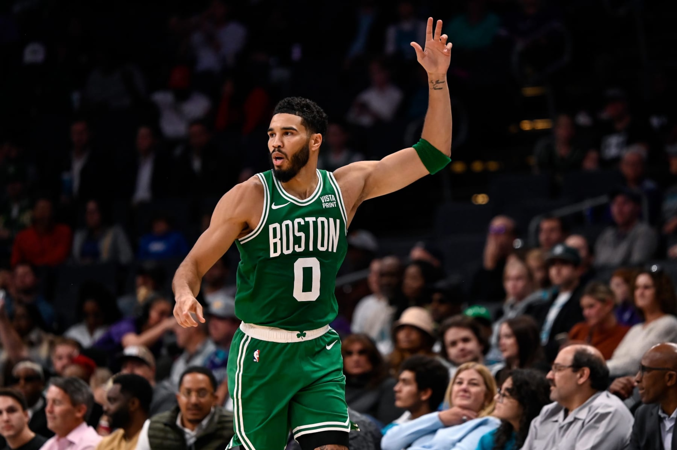 CHARLOTTE, NORTH CAROLINA - OCTOBER 19: Jayson Tatum #0 of the Boston Celtics gestures after making a three point basket against the Charlotte Hornets during the first quarter at Spectrum Center on October 19, 2023 in Charlotte, North Carolina. NOTE TO USER: User expressly acknowledges and agrees that, by downloading and or using this photograph, User is consenting to the terms and conditions of the Getty Images License Agreement.  (Photo by Matt Kelley/Getty Images)