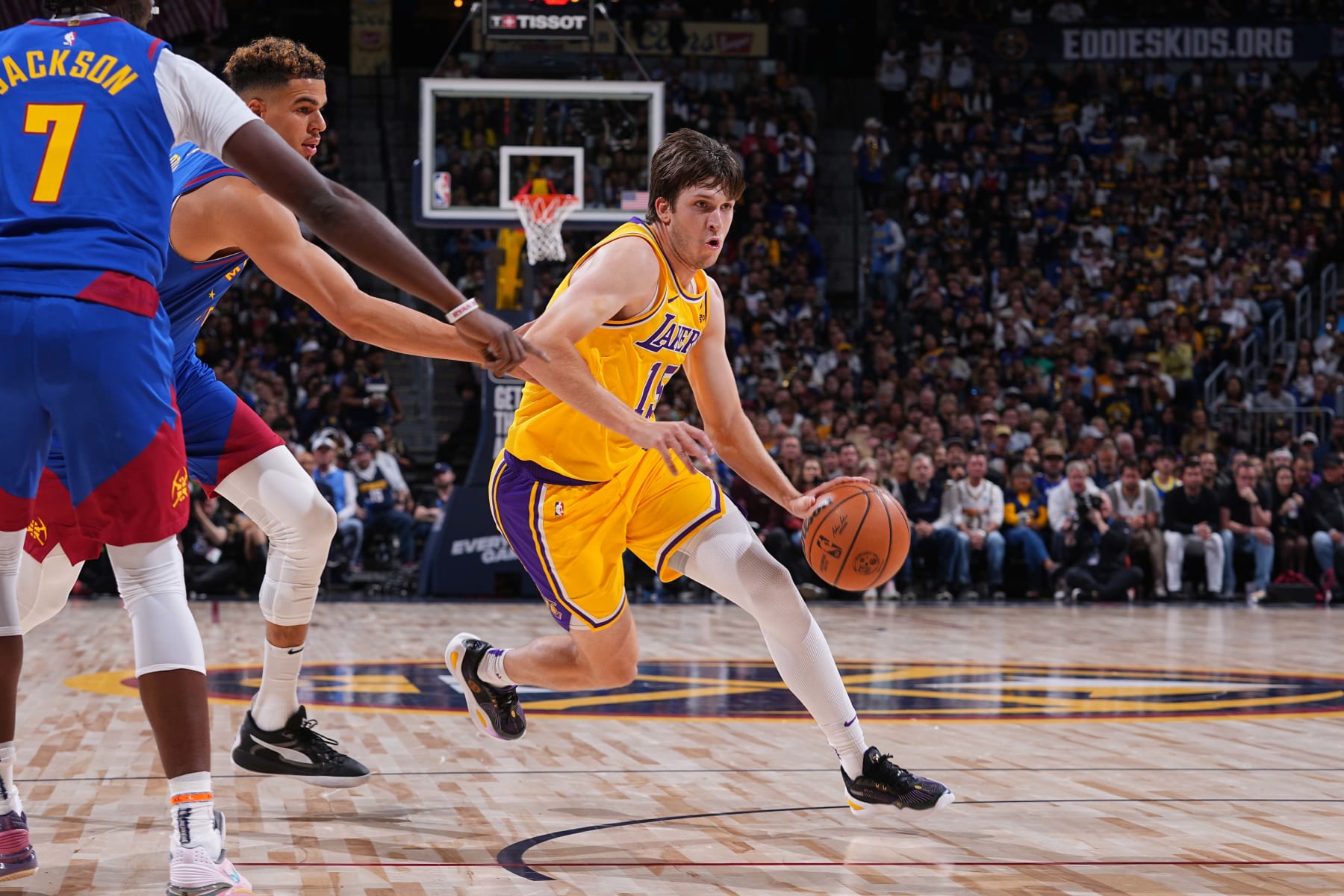 DENVER, CO - OCTOBER 24: Austin Reaves #15 of the Los Angeles Lakers dribbles the ball during the game against the Denver Nuggets on October 24, 2023 at the Ball Arena in Denver, Colorado. NOTE TO USER: User expressly acknowledges and agrees that, by downloading and/or using this Photograph, user is consenting to the terms and conditions of the Getty Images License Agreement. Mandatory Copyright Notice: Copyright 2023 NBAE (Photo by Bart Young/NBAE via Getty Images)
