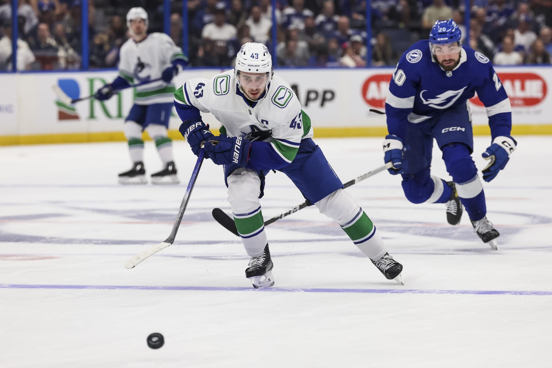 TAMPA, FL - OCTOBER 19: Quinn Hughes #43 of the Vancouver Canucks against the Tampa Bay Lightning during the third period at Amalie Arena on October 19, 2023 in Tampa, Florida. (Photo by Mark LoMoglio/NHLI via Getty Images)