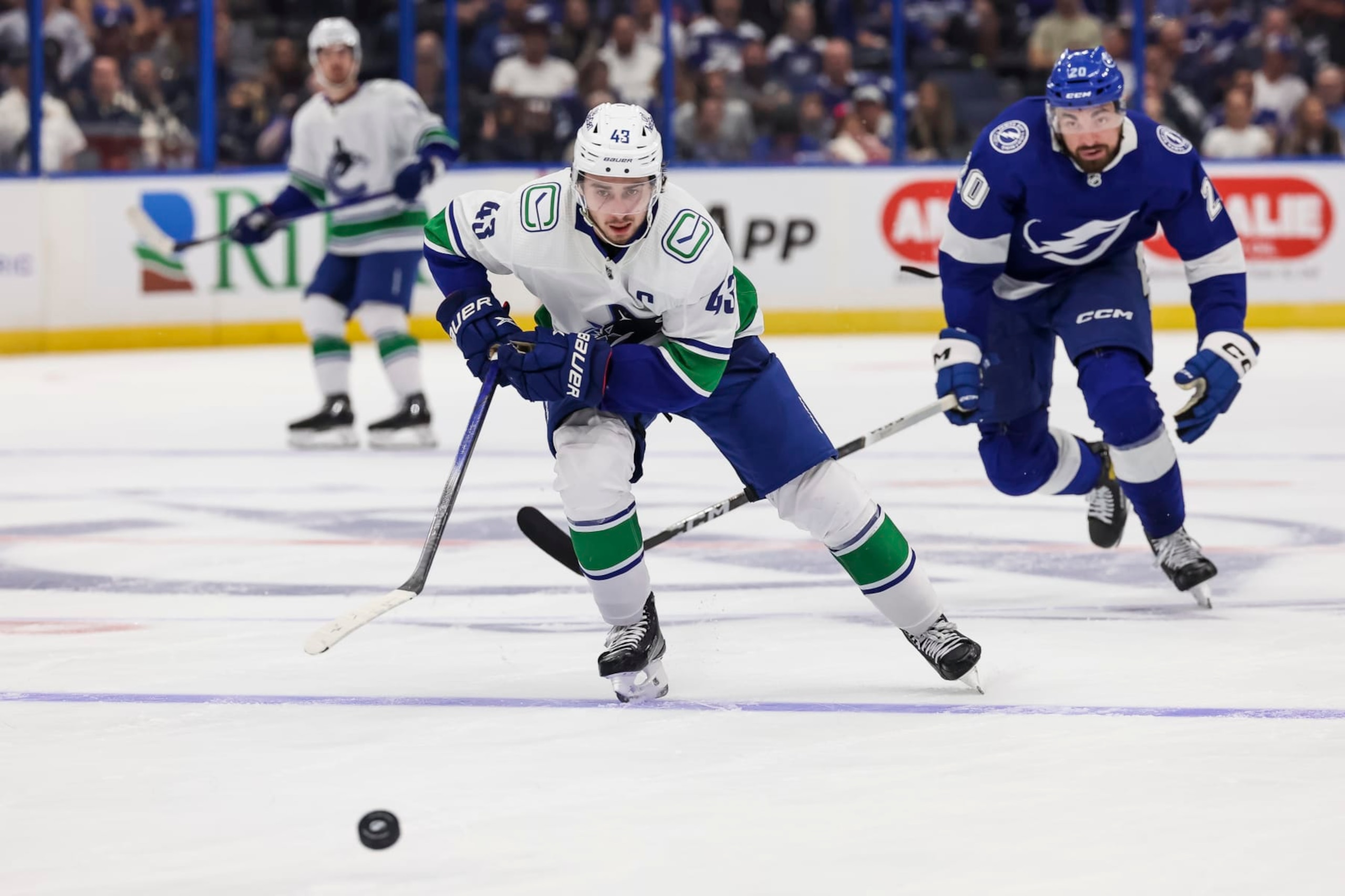 TAMPA, FL - OCTOBER 19: Quinn Hughes #43 of the Vancouver Canucks against the Tampa Bay Lightning during the third period at Amalie Arena on October 19, 2023 in Tampa, Florida. (Photo by Mark LoMoglio/NHLI via Getty Images)