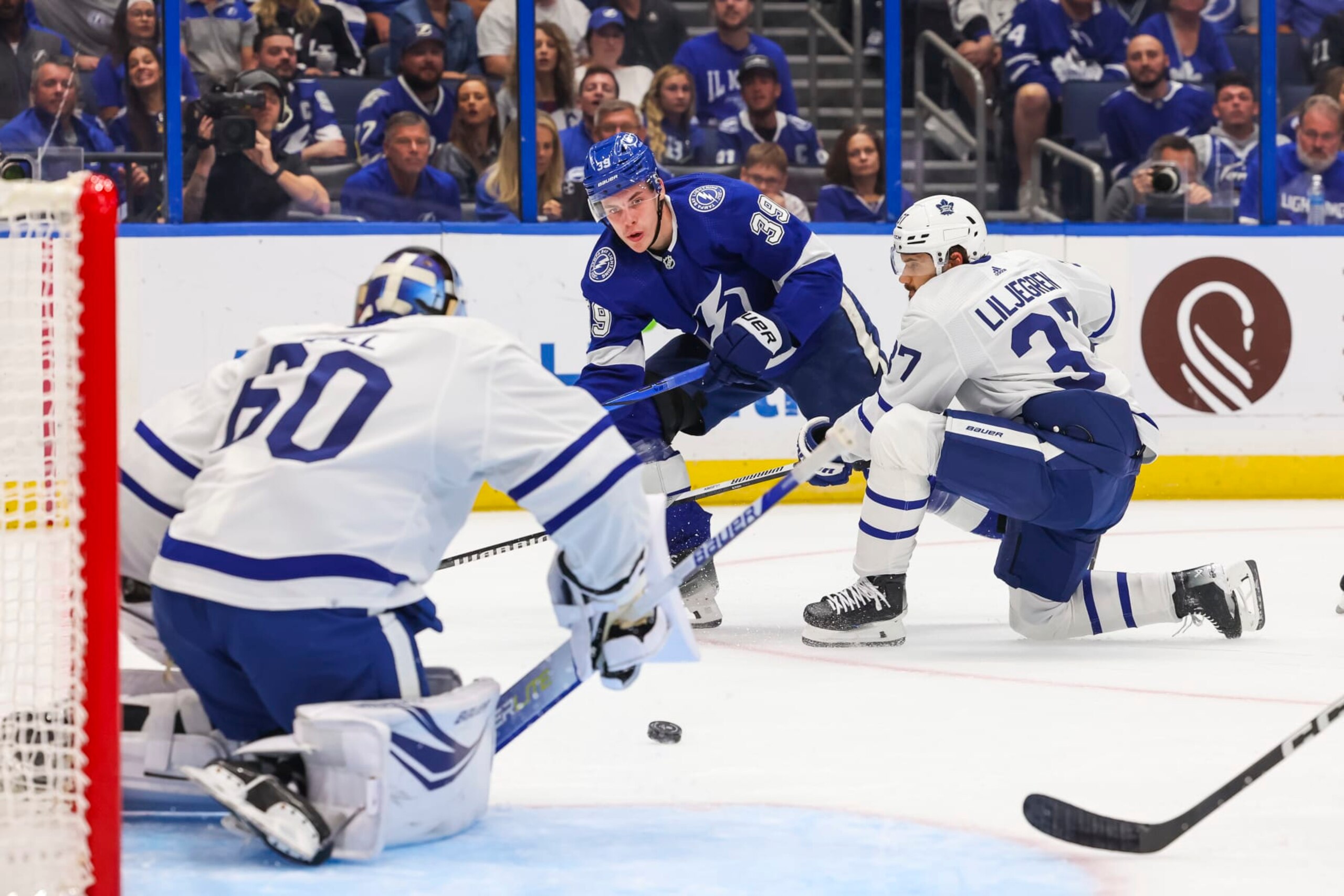 TAMPA, FL - OCTOBER 21: Waltteri Merela #39 of the Tampa Bay Lightning against goalie Joseph Woll #60 and Timothy Liljegren #37 of the Toronto Maple Leafs during the first period at Amalie Arena on October 21, 2023 in Tampa, Florida. (Photo by Mark LoMoglio/NHLI via Getty Images)