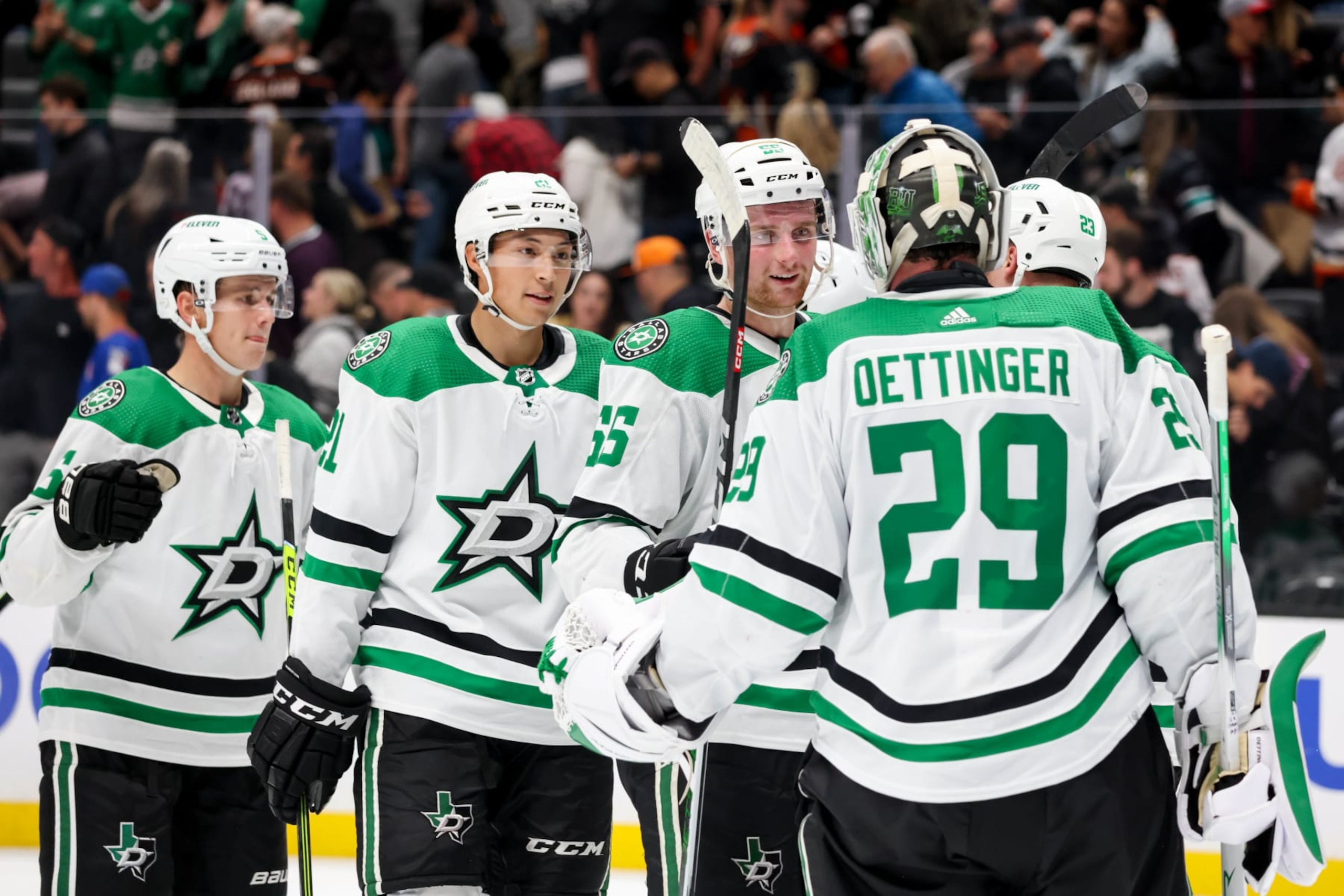 ANAHEIM, CA - OCTOBER 19:  Jake Oettinger #29 of the Dallas Stars celebrates their victory with teammates against the Anaheim Ducks at Honda Center on October 19, 2023 in Anaheim, California. (Photo by Debora Robinson/NHLI via Getty Images)