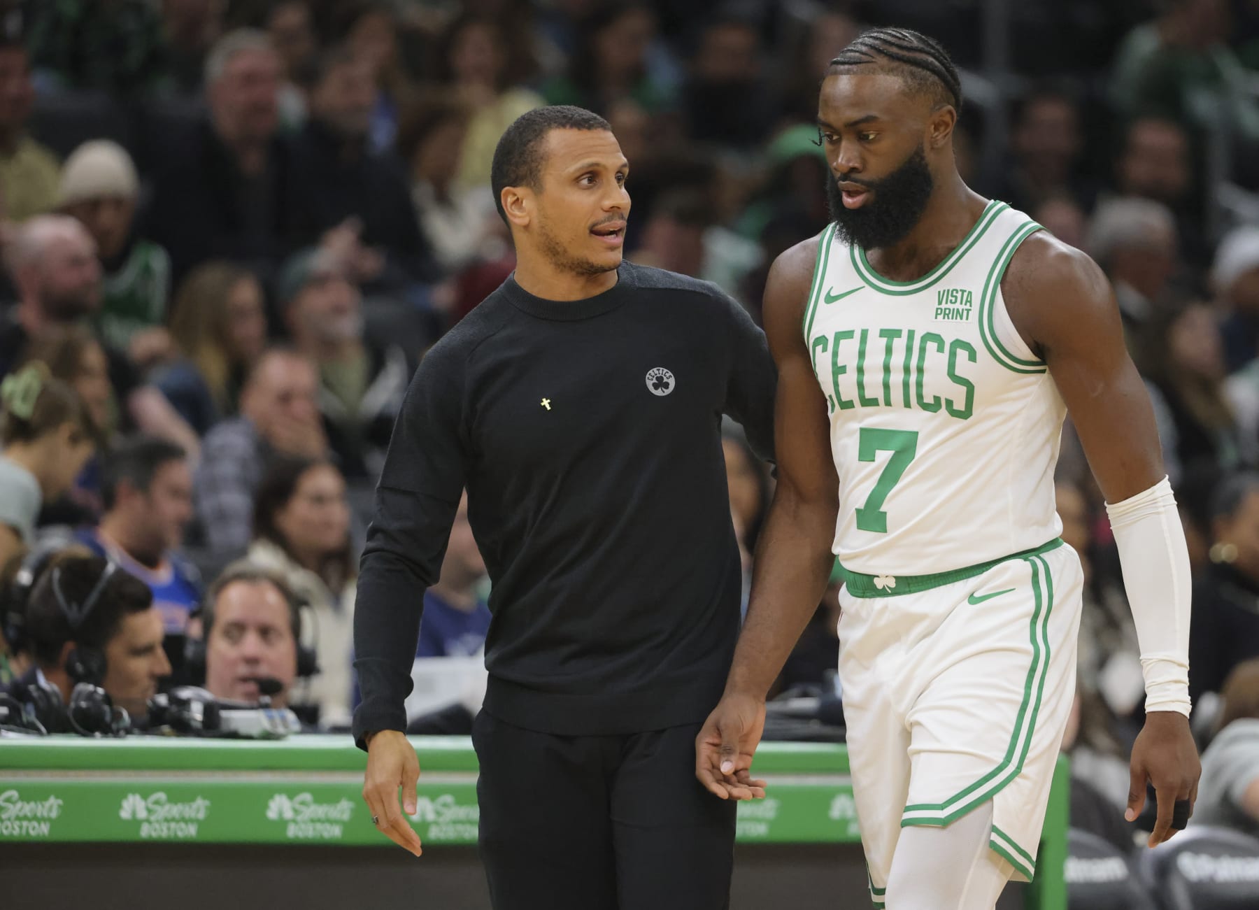 Boston, MA - October 17: Boston Celtics head coach Joe Mazzulla talks with SG Jaylen Brown as he heads back to the bench in the first quarter. The Celtics beat the New York Knicks, 123-110. (Photo by Matthew J. Lee/The Boston Globe via Getty Images)
