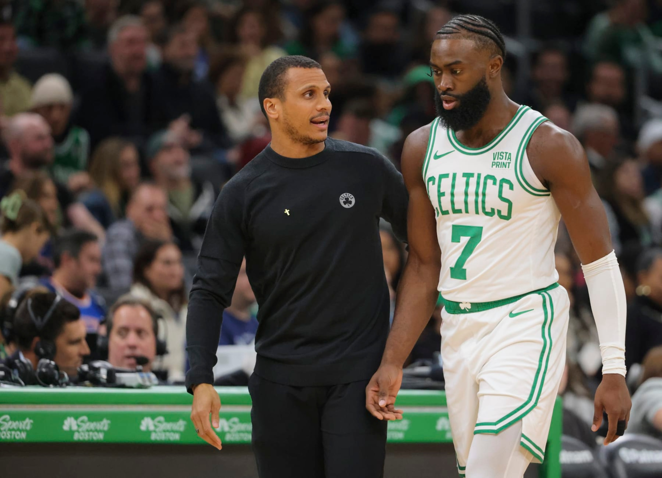 Boston, MA - October 17: Boston Celtics head coach Joe Mazzulla talks with SG Jaylen Brown as he heads back to the bench in the first quarter. The Celtics beat the New York Knicks, 123-110. (Photo by Matthew J. Lee/The Boston Globe via Getty Images)