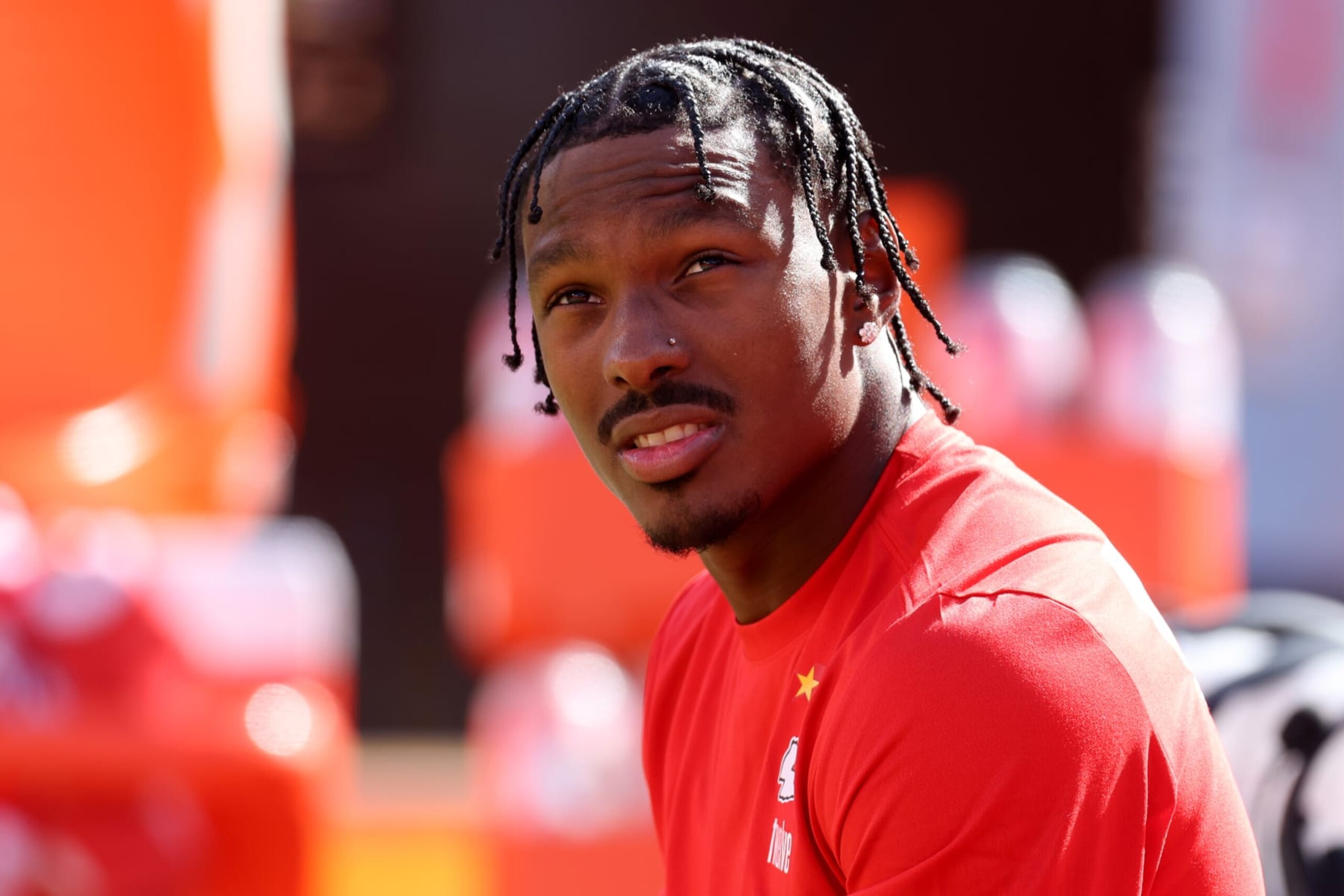 KANSAS CITY, MISSOURI - OCTOBER 22: Mecole Hardman Jr. #12 of the Kansas City Chiefs talks to teammates before the game against the Los Angeles Chargers at GEHA Field at Arrowhead Stadium on October 22, 2023 in Kansas City, Missouri. (Photo by Jamie Squire/Getty Images)