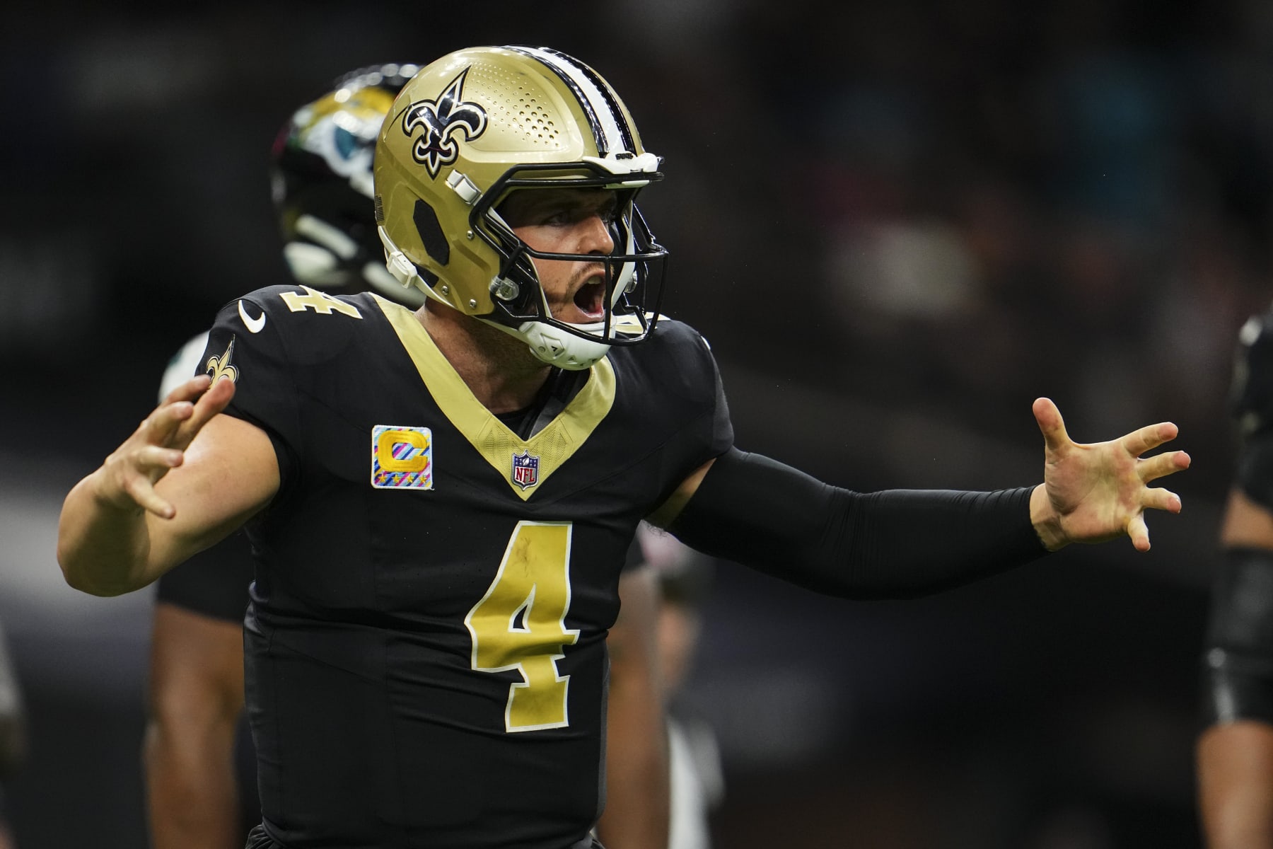 NEW ORLEANS, LA - OCTOBER 19: Derek Carr #4 of the New Orleans Saints reacts during an NFL football game against the Jacksonville Jaguars at Caesars Superdome on October 19, 2023 in New Orleans, Louisiana. (Photo by Cooper Neill/Getty Images)