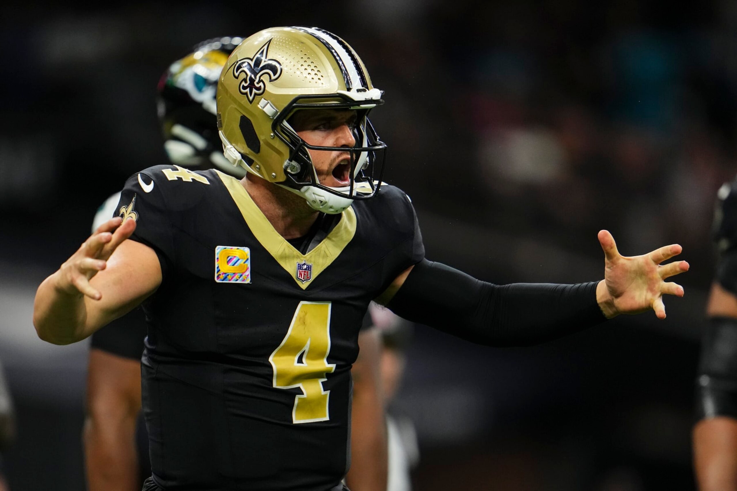 NEW ORLEANS, LA - OCTOBER 19: Derek Carr #4 of the New Orleans Saints reacts during an NFL football game against the Jacksonville Jaguars at Caesars Superdome on October 19, 2023 in New Orleans, Louisiana. (Photo by Cooper Neill/Getty Images)