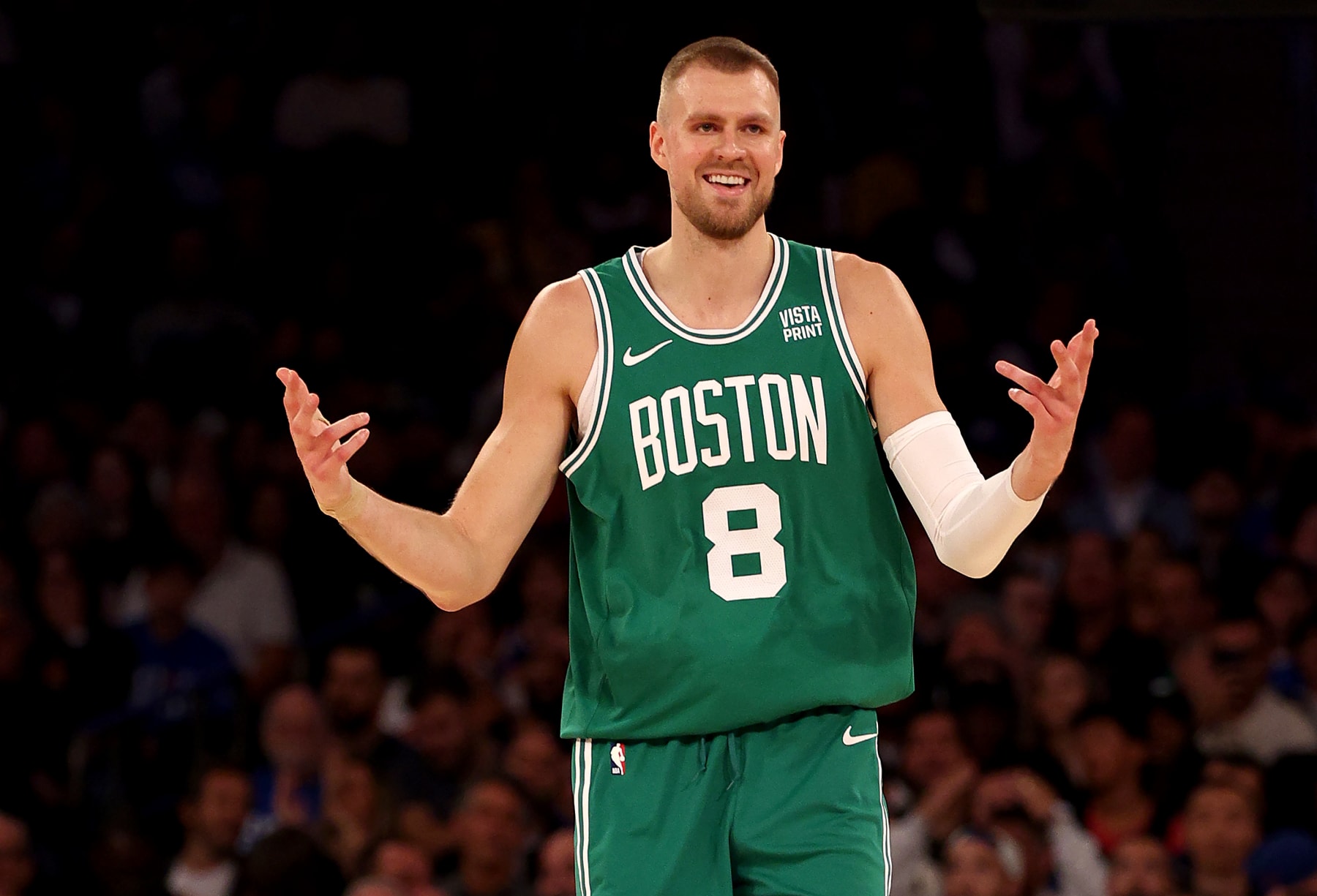 NEW YORK, NEW YORK - OCTOBER 25:  Kristaps Porzingis #8 of the Boston Celtics celebrates his three point shot in the first quarter against the New York Knicks at Madison Square Garden on October 25, 2023 in New York City. NOTE TO USER: User expressly acknowledges and agrees that, by downloading and or using this photograph, User is consenting to the terms and conditions of the Getty Images License Agreement. (Photo by Elsa/Getty Images)