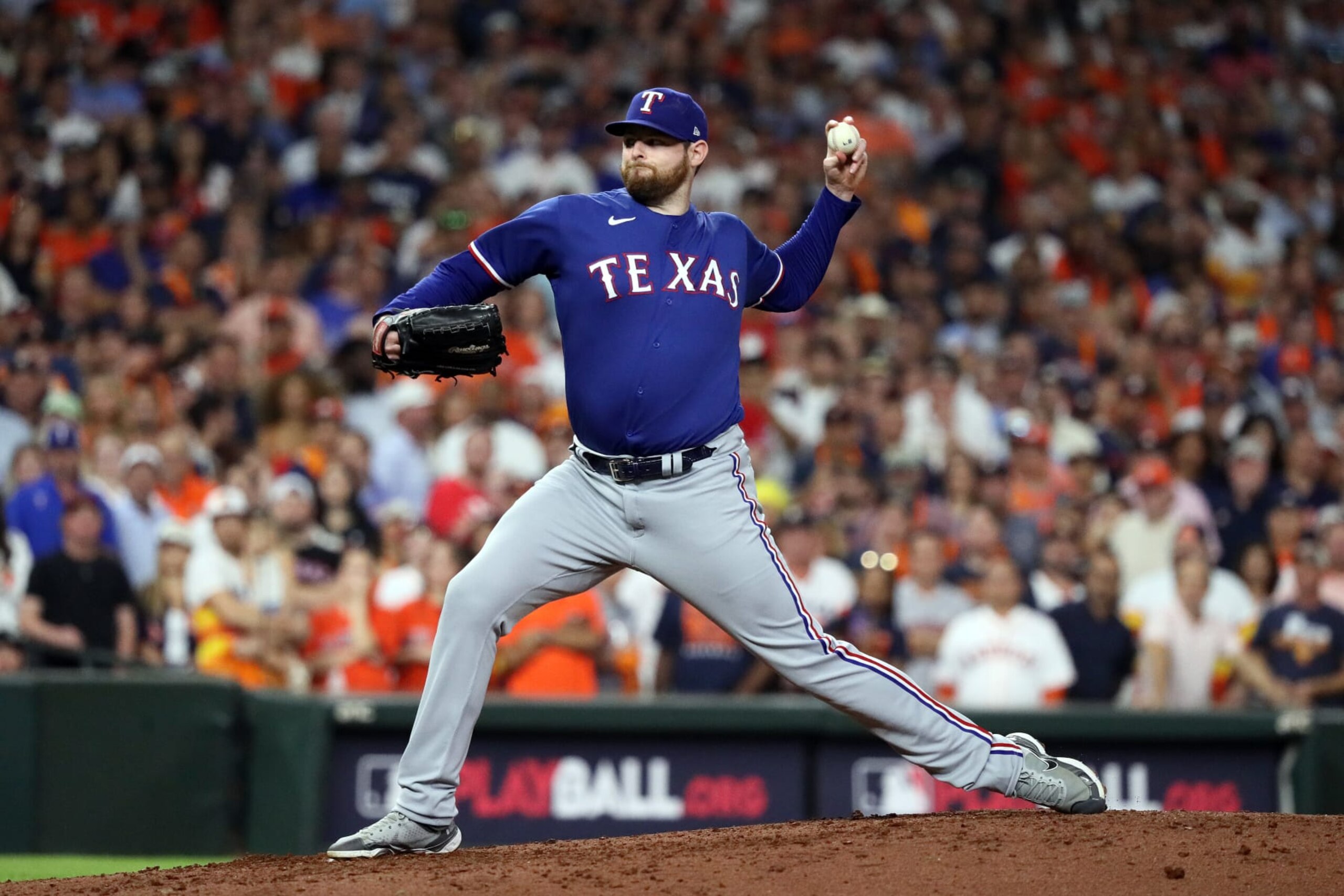 HOUSTON, TEXAS - OCTOBER 23: Jordan Montgomery #52 of the Texas Rangers throws a pitch against the Houston Astros during the third inning in Game Seven of the American League Championship Series at Minute Maid Park on October 23, 2023 in Houston, Texas. (Photo by Bob Levey/Getty Images)