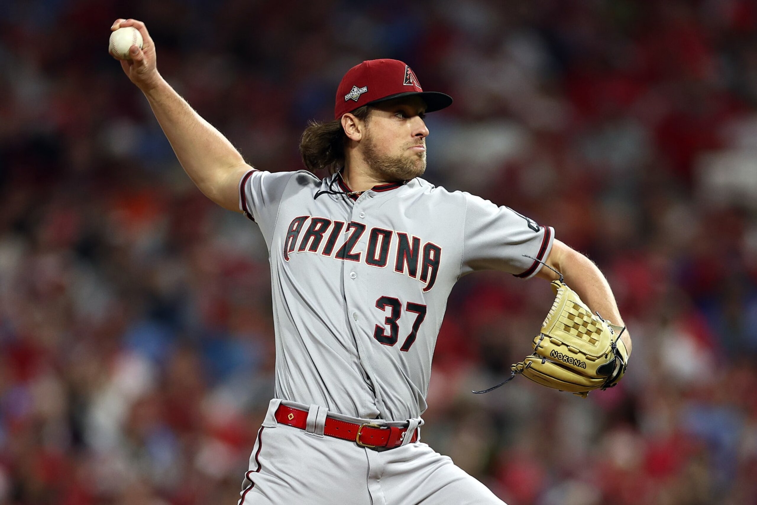 PHILADELPHIA, PENNSYLVANIA - OCTOBER 24: Kevin Ginkel #37 of the Arizona Diamondbacks pitches against the Philadelphia Phillies during the seventh inning in Game Seven of the Championship Series at Citizens Bank Park on October 24, 2023 in Philadelphia, Pennsylvania. (Photo by Elsa/Getty Images)