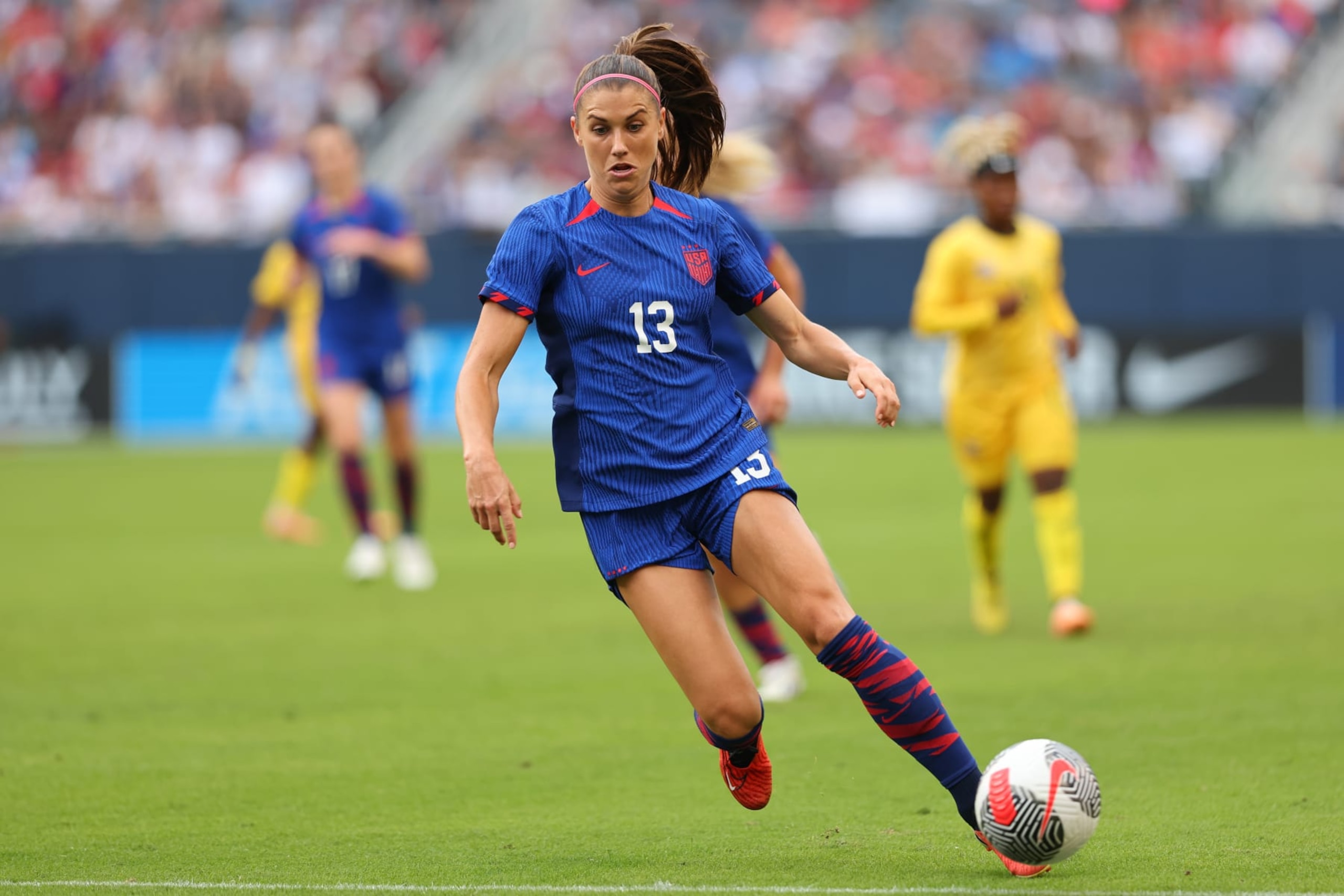 CHICAGO, ILLINOIS - SEPTEMBER 24: Alex Morgan #13 of the United States controls the ball against South Africa during the first half at Soldier Field on September 24, 2023 in Chicago, Illinois. (Photo by Michael Reaves/Getty Images)