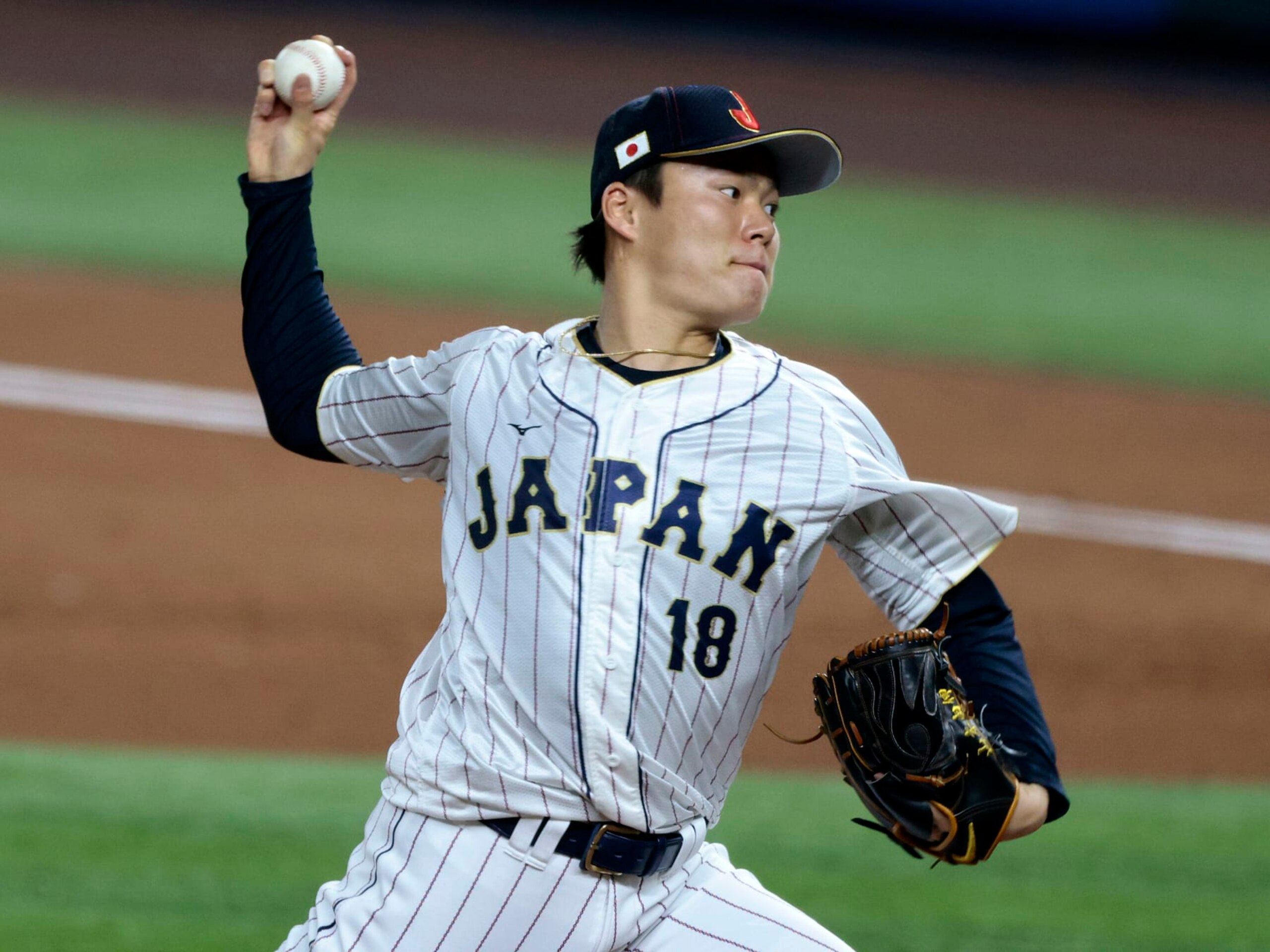 MIAMI, FL - MARCH 20: Yoshinobu Yamamoto #18 of Team Japan pitches during the 2023 World Baseball Classic Semifinal game against Team Mexico at loanDepot Park on Monday, March 20, 2023 in Miami, Florida. (Photo by Christopher Pasatieri/Getty Images)