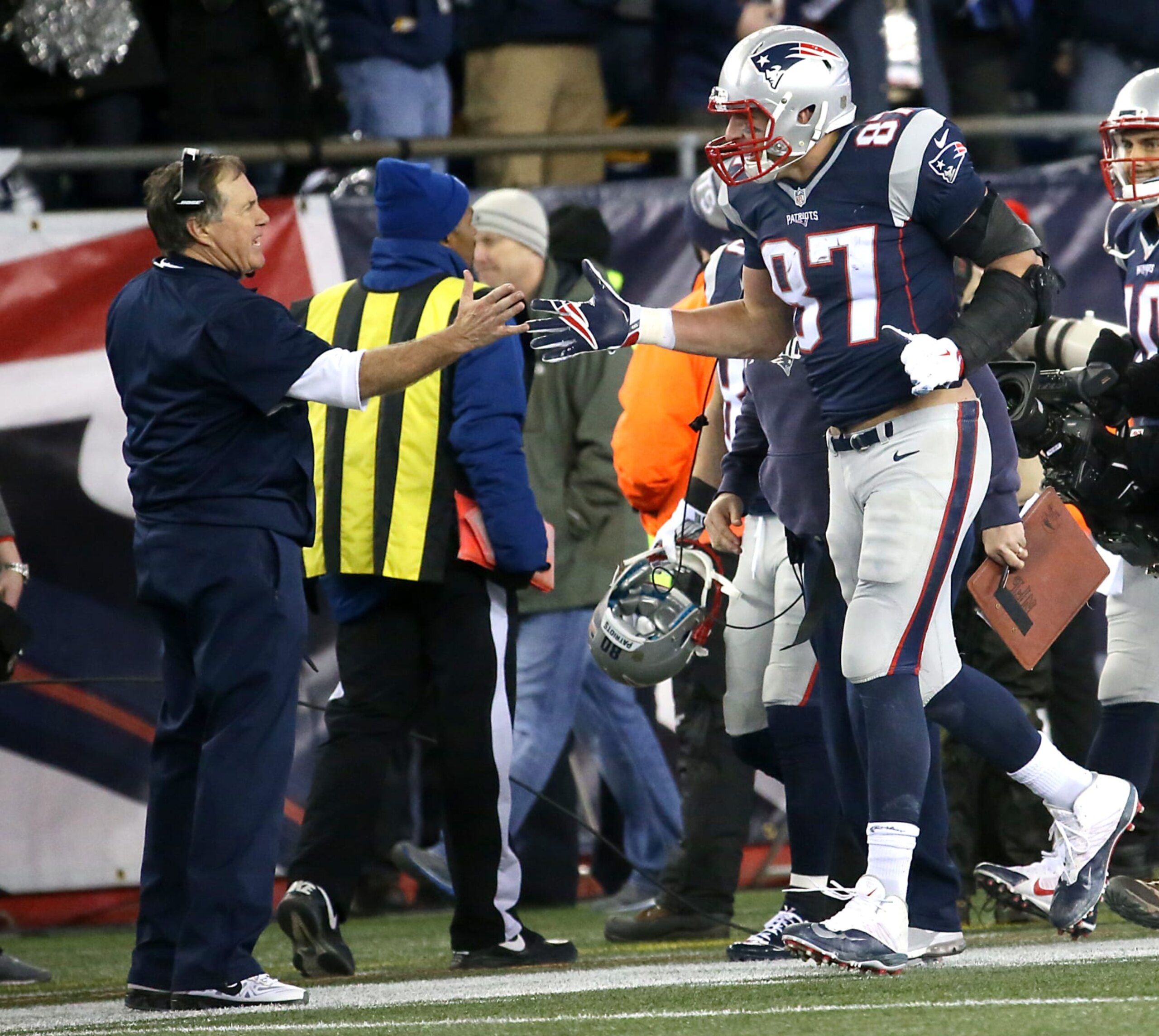 FOXBOROUGH, MA - JANUARY 16: Patriots tight end Rob Gronkowski celebrates his 16-yard touchdown reception with head coach Bill Belichick during third quarter action. The New England Patriots hosted the Kansas City Chiefs in an AFC divisional playoff game at Gillette Stadium in Foxborough, Mass., Saturday, Jan. 16, 2016. (Photo by Matthew J. Lee/The Boston Globe via Getty Images)