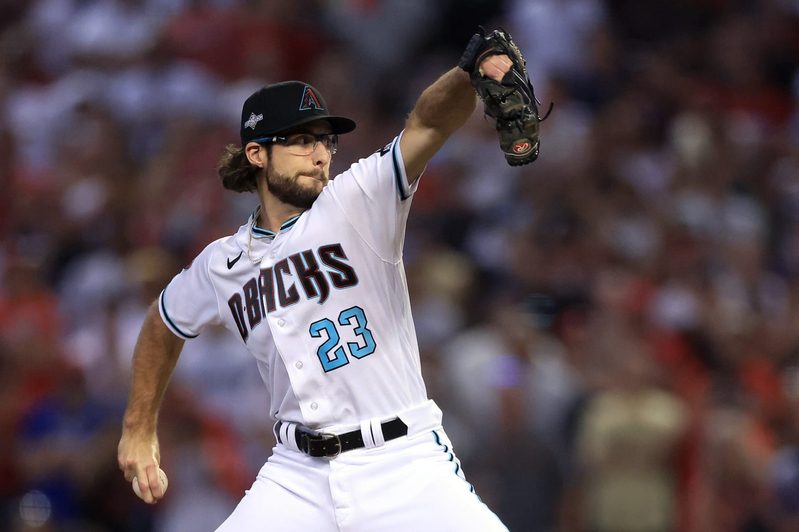 PHOENIX, ARIZONA - OCTOBER 21: Zac Gallen #23 of the Arizona Diamondbacks throws a pitch against the Philadelphia Phillies during the first inning  during Game Five of the Championship Series at Chase Field on October 21, 2023 in Phoenix, Arizona. (Photo by Sean M. Haffey/Getty Images)