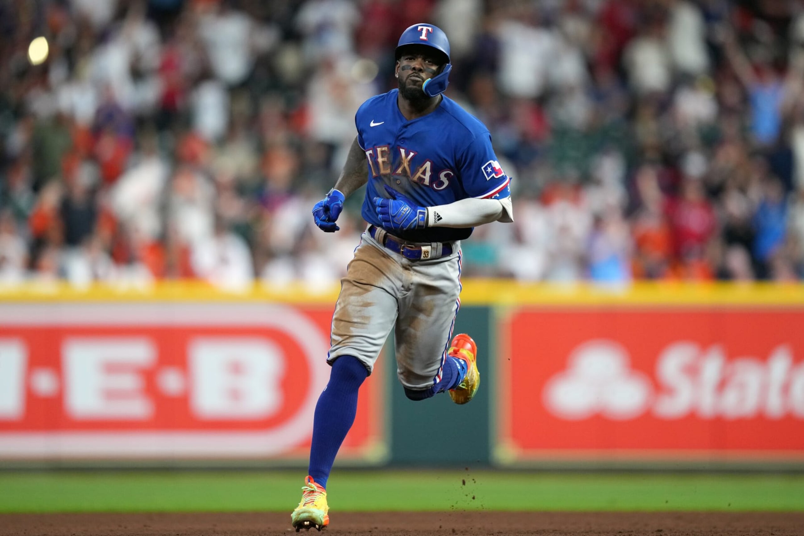 HOUSTON, TX - OCTOBER 23: Adolis Garcia #53 of the Texas Rangers rounds the bases after hitting a home run in the eighth inning during Game 7 of the ALCS between the Texas Rangers and the Houston Astros at Minute Maid Park on Monday, October 23, 2023 in Houston, Texas. (Photo by Alex Bierens de Haan/MLB Photos via Getty Images)